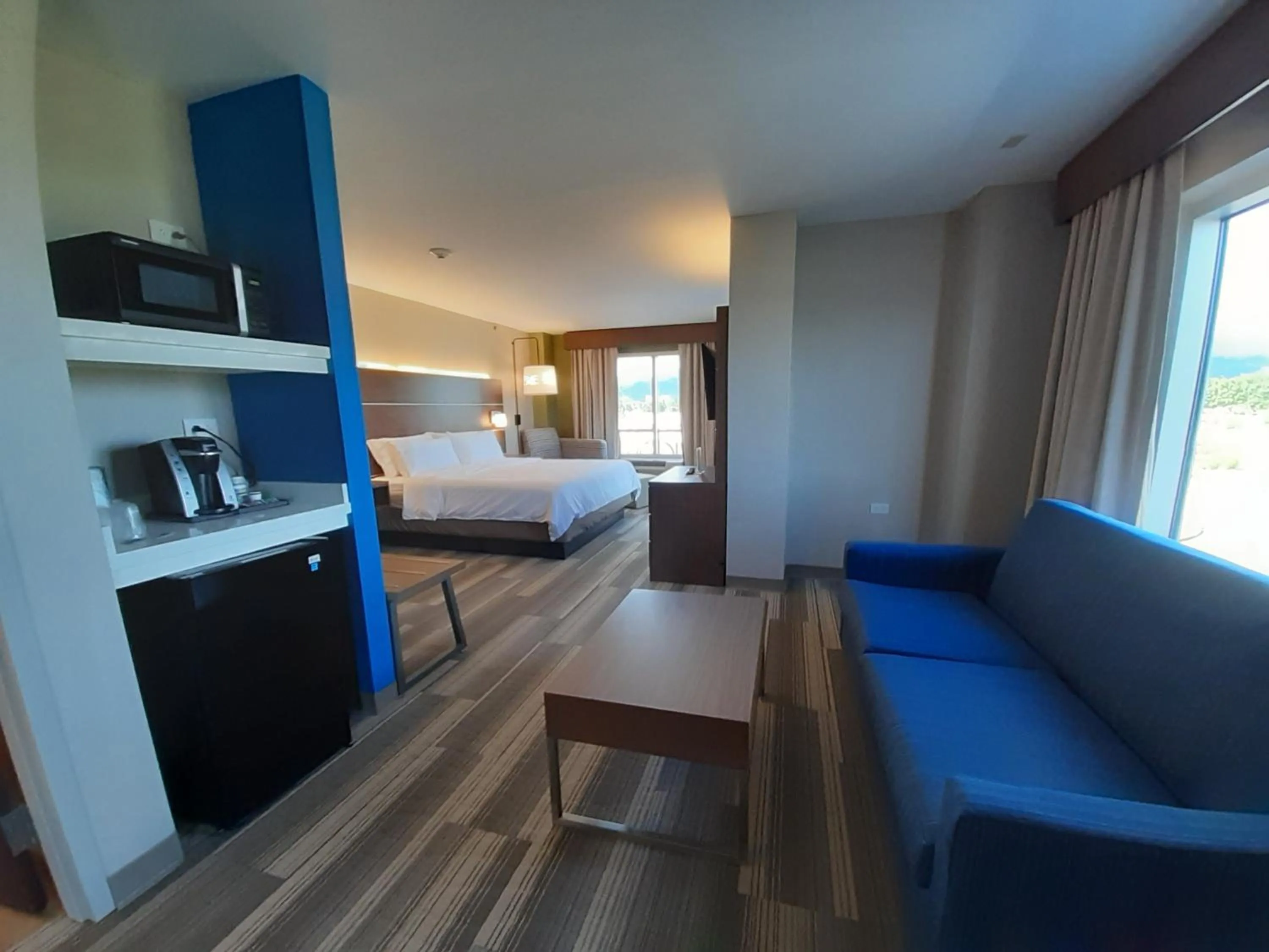 King Suite with Sofa Bed in Holiday Inn Express Trincity by IHG