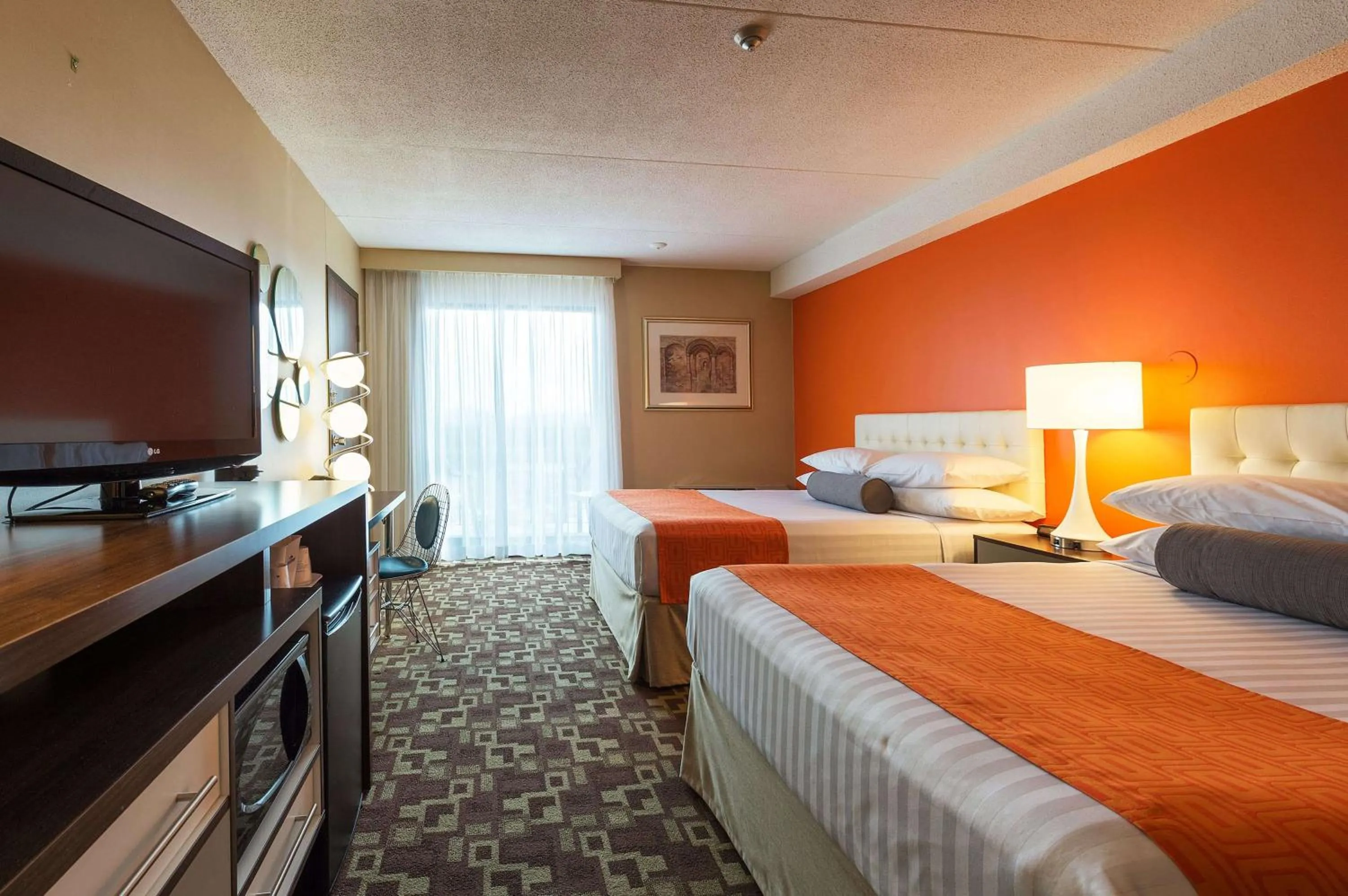 Balcony Queen Room with Two Queen Beds - Non-Smoking in Howard Johnson Plaza by Wyndham by the Falls Niagara Falls