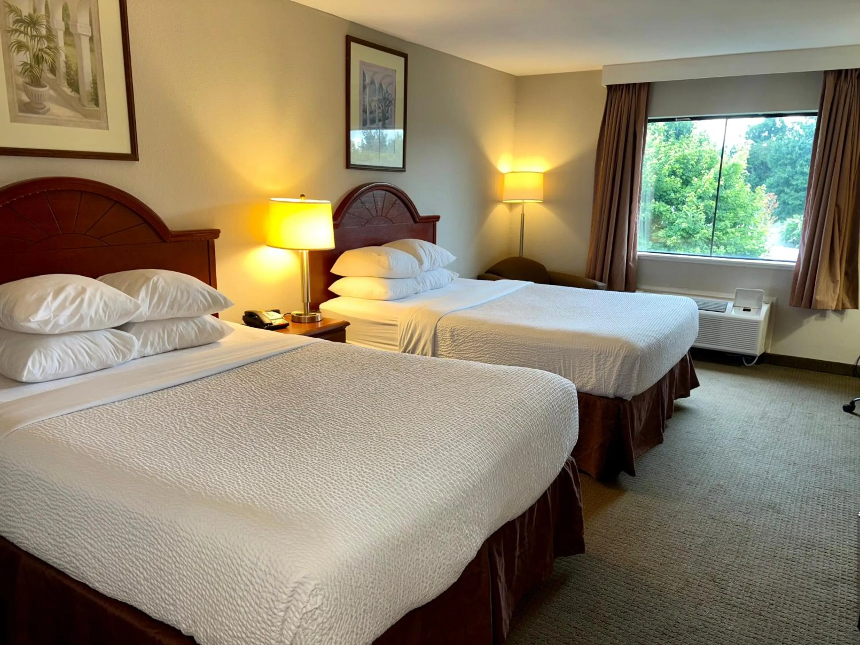 Queen Room with Two Queen Beds - High Floor - Non-Smoking in Days Inn & Suites by Wyndham Laurel Near Fort Meade