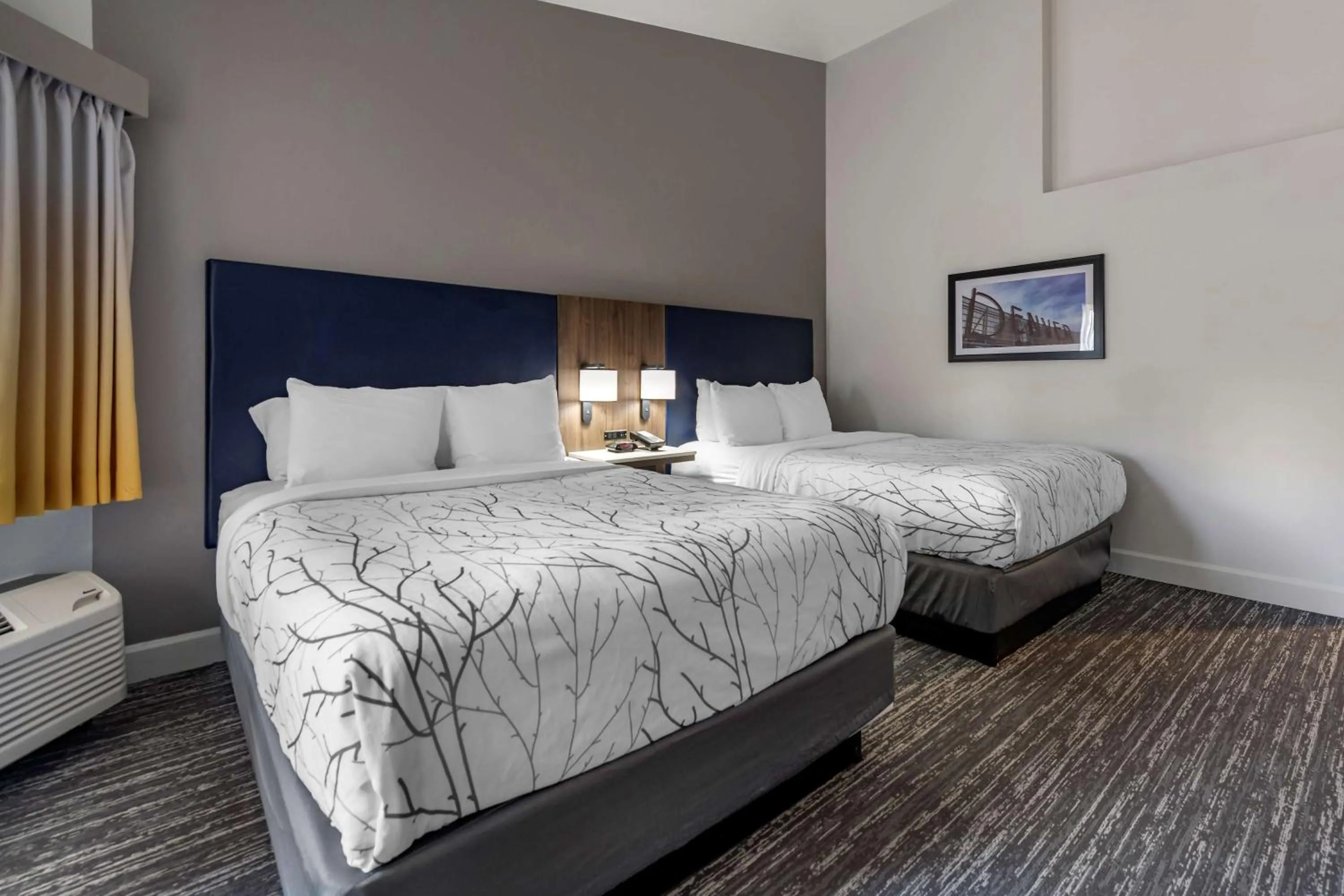 Queen Room with Two Queen Beds and Patio in Best Western Premier Denver East