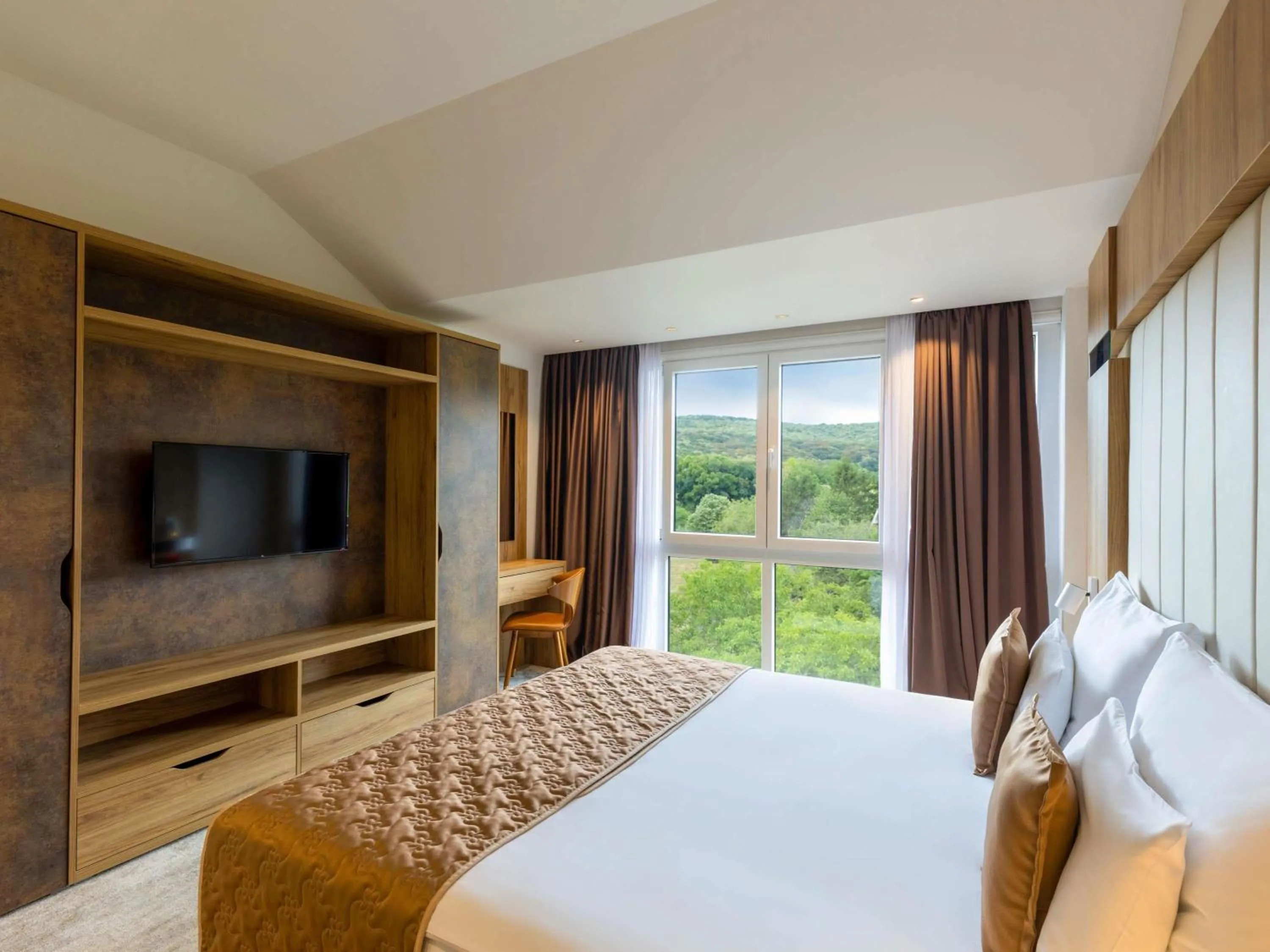 Superior Suite with One King Bed and Balcony - single occupancy in Movenpick Resort and Spa Fruske Terme