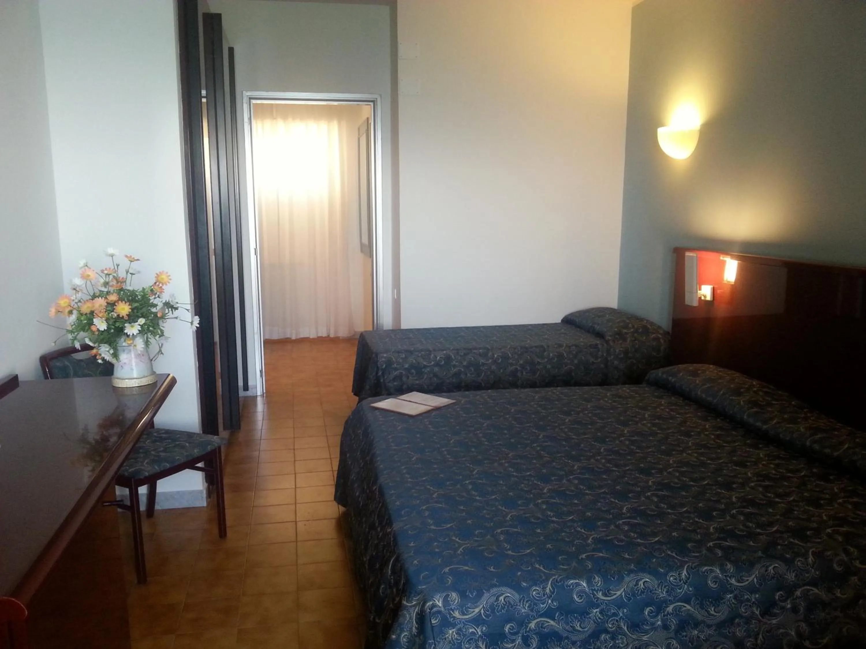 Quadruple Room in Grand Hotel Dei Cesari Dependance