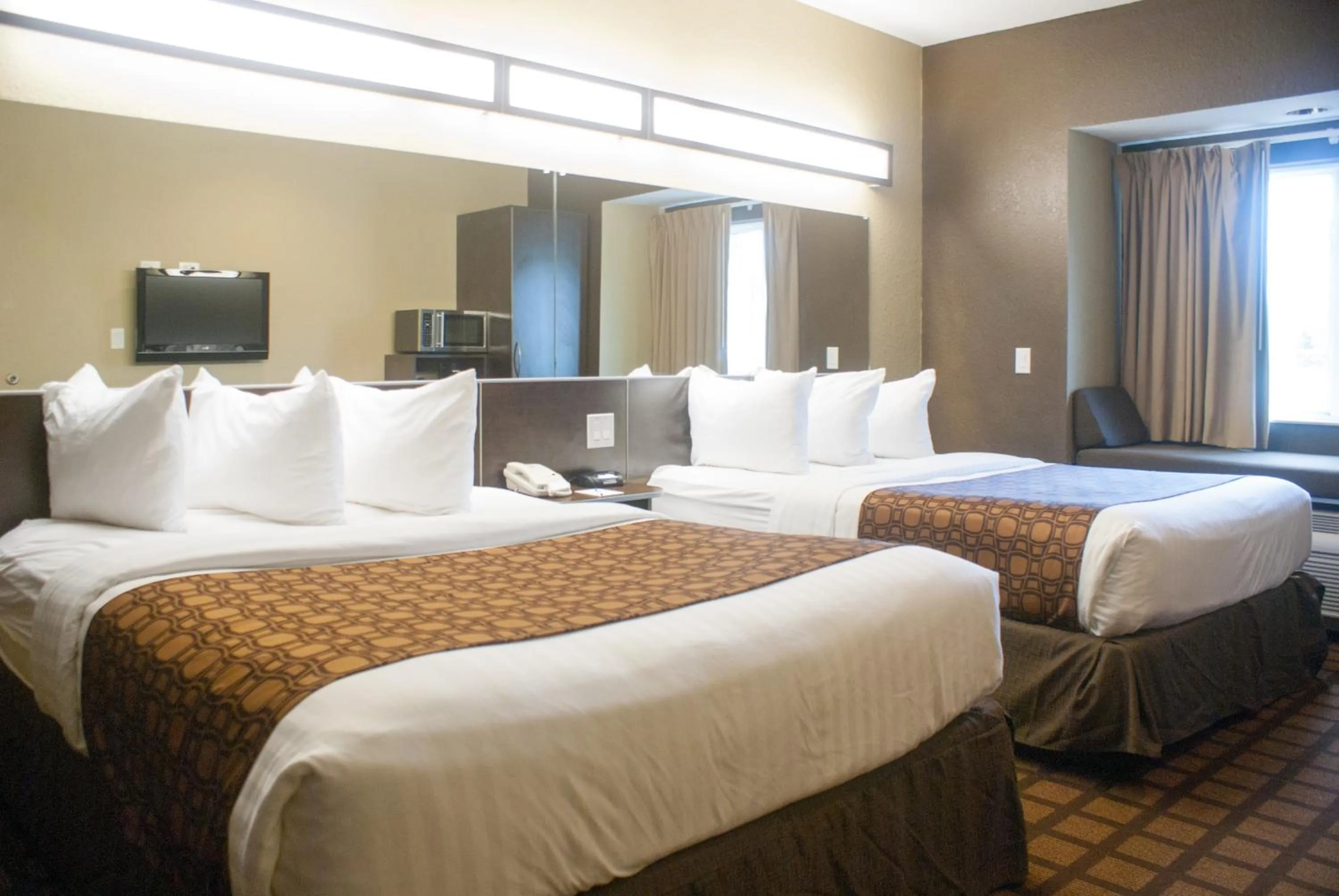 Queen Room with Two Queen Beds - Non-Smoking in Microtel Inn & Suites by Wyndham Jacksonville Airport