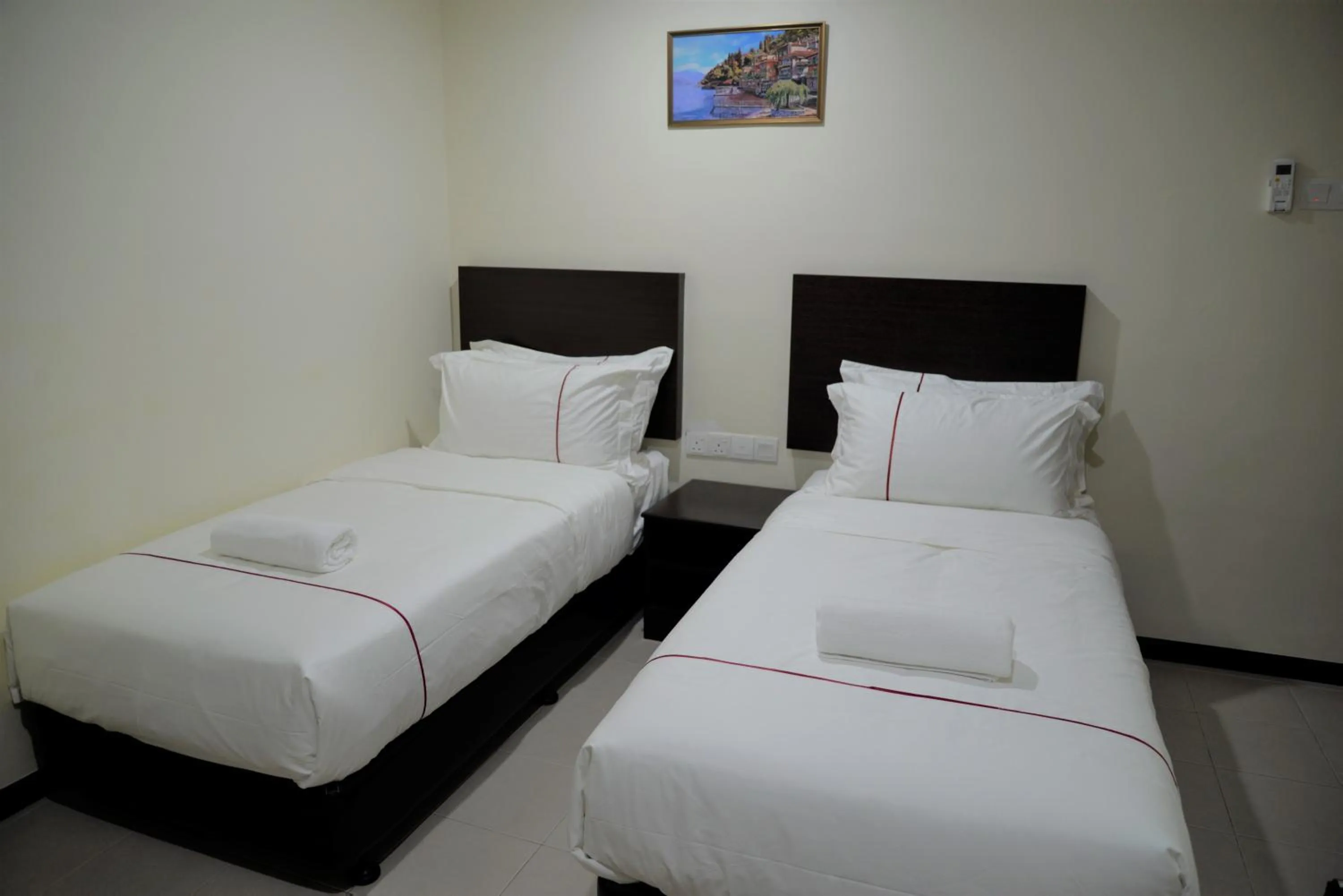 Superior Twin Room with No Window - single occupancy in DCozy Hotel