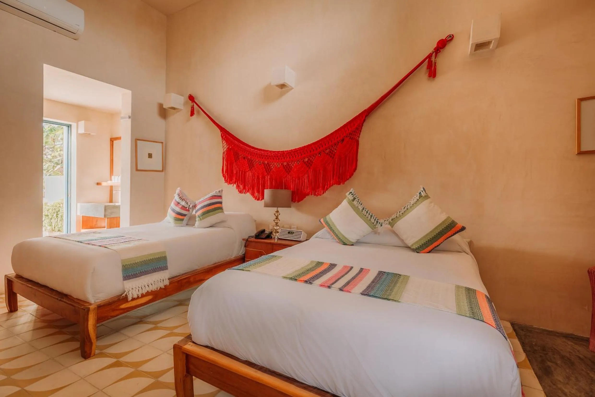 Deluxe Family Room with Balcony, Air Conditioning and Private Bathroom in Waye Valladolid Centro - Sustainable, Authentic Experiences & Pet Friendly Boutique Hotel