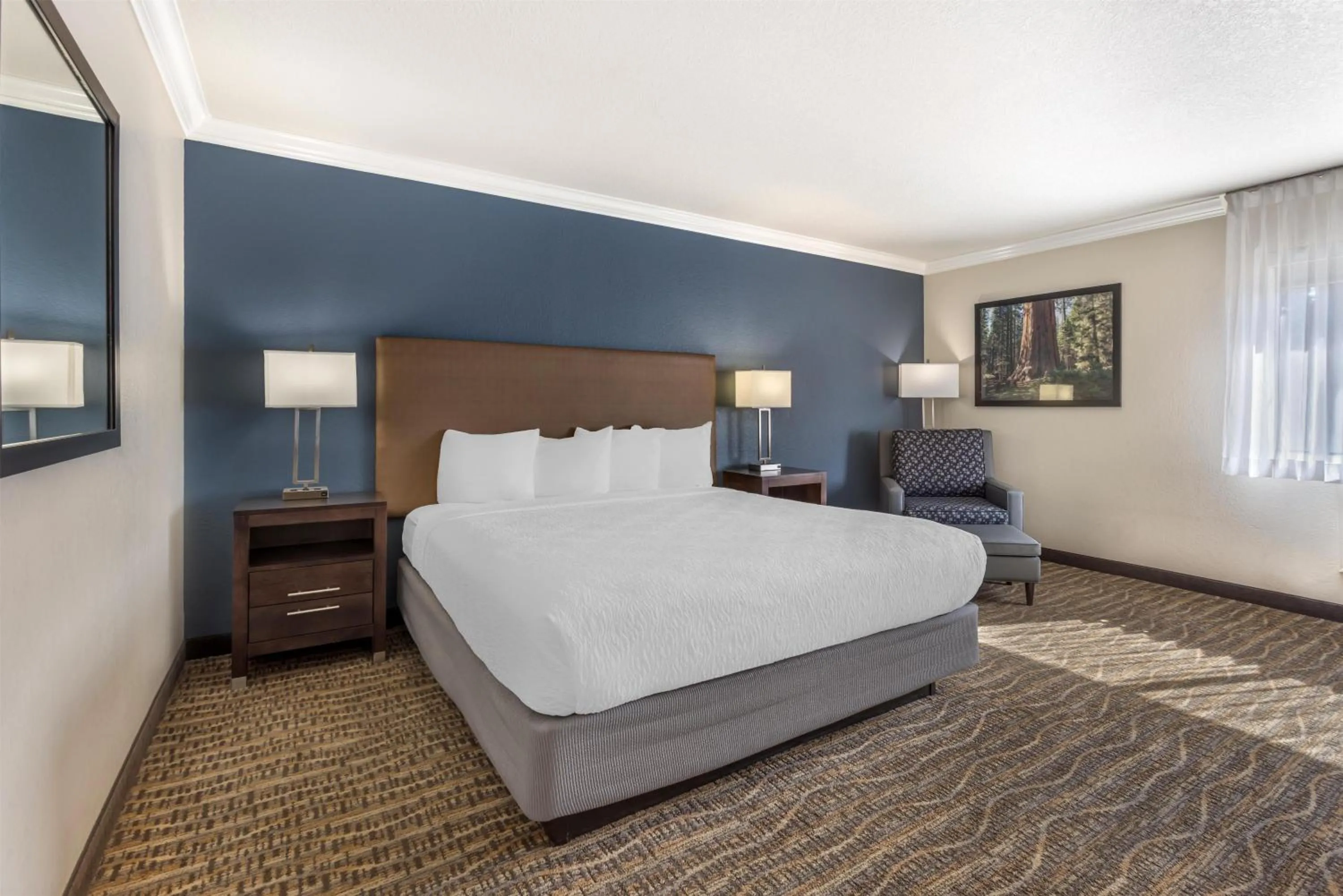 Two-Room Suite with One King and One Queen Bed - Non-Smoking in Best Western Town & Country Lodge