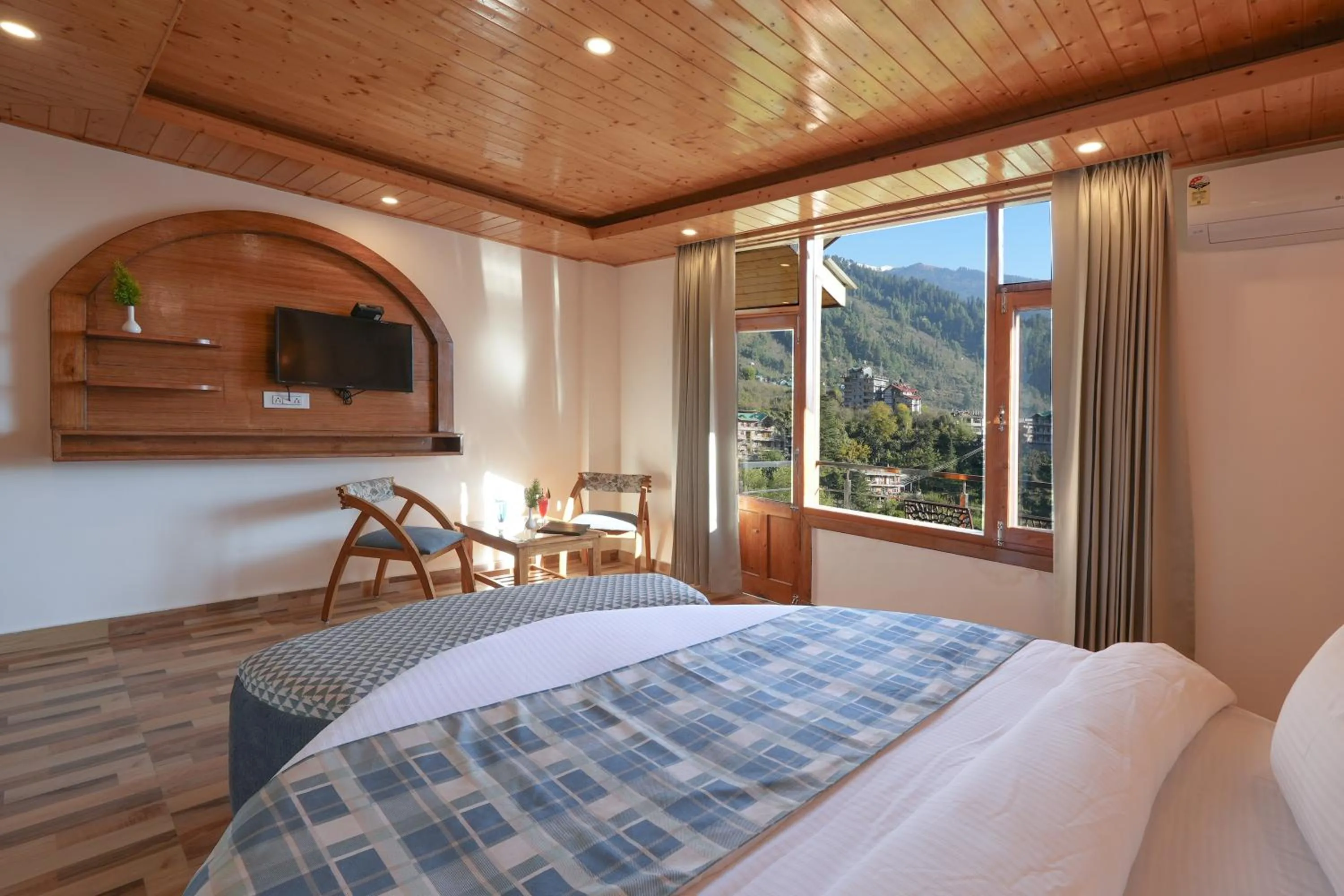 Junior Suite with Balcony in Snow City's Montana Blues Resort Manali - Heated & Air-Cooled Stay