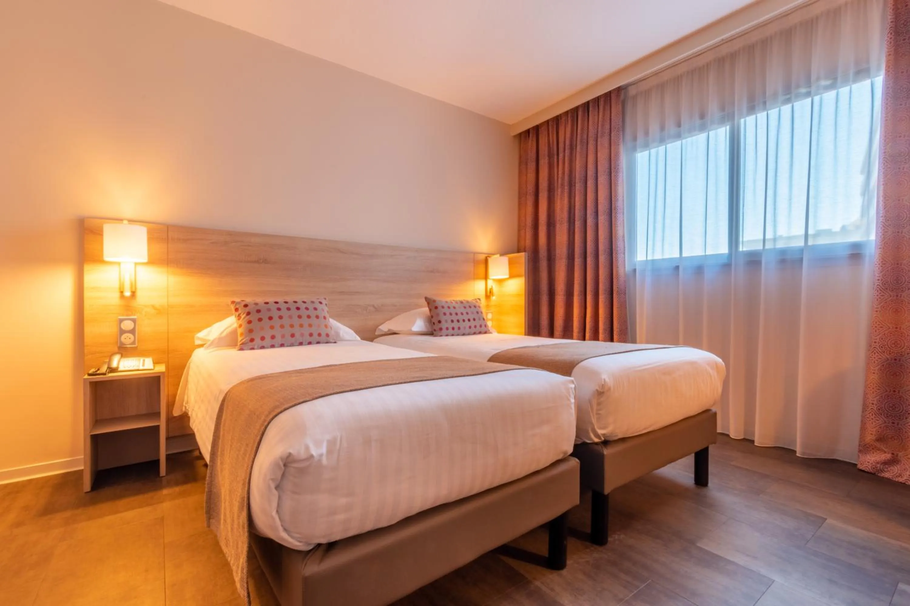 Twin Room in Hôtel L'Empreinte