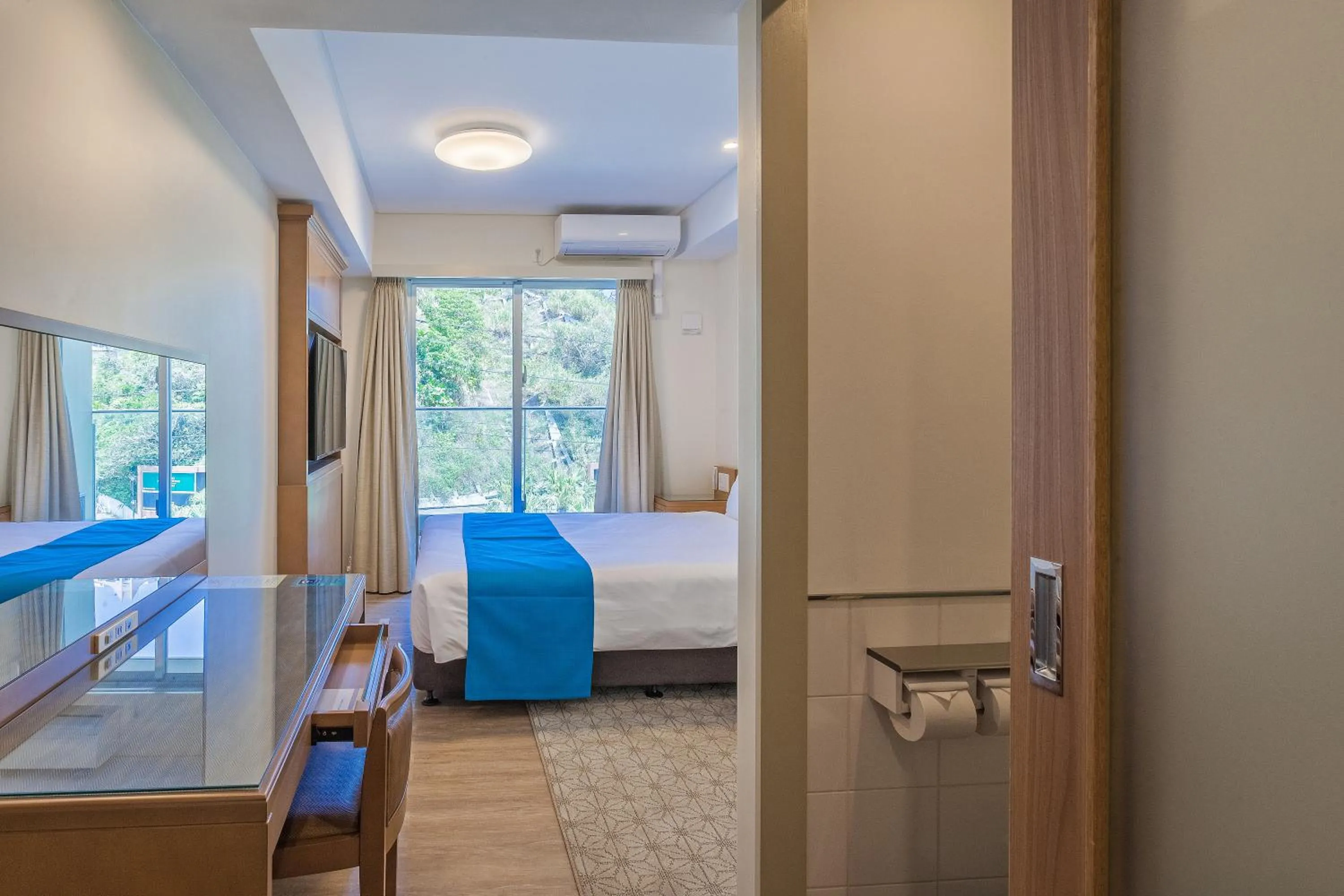 Queen Room - single occupancy in Kariyushi LCH. Resort