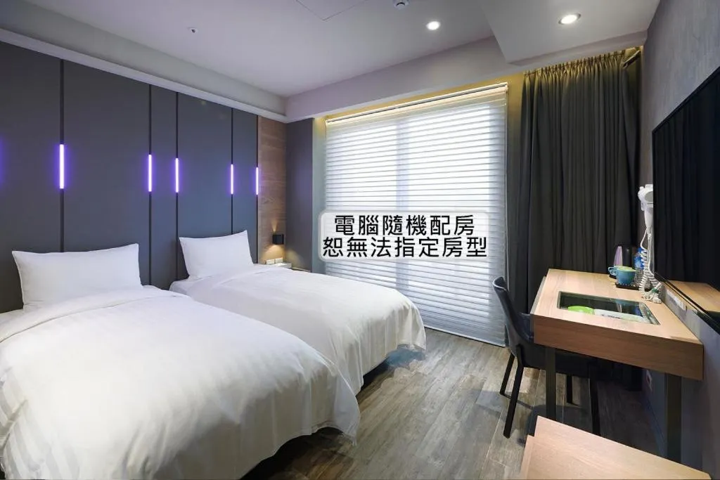 Twin Room with Balcony in KIWI SHARE HOTEL ZHONGLI