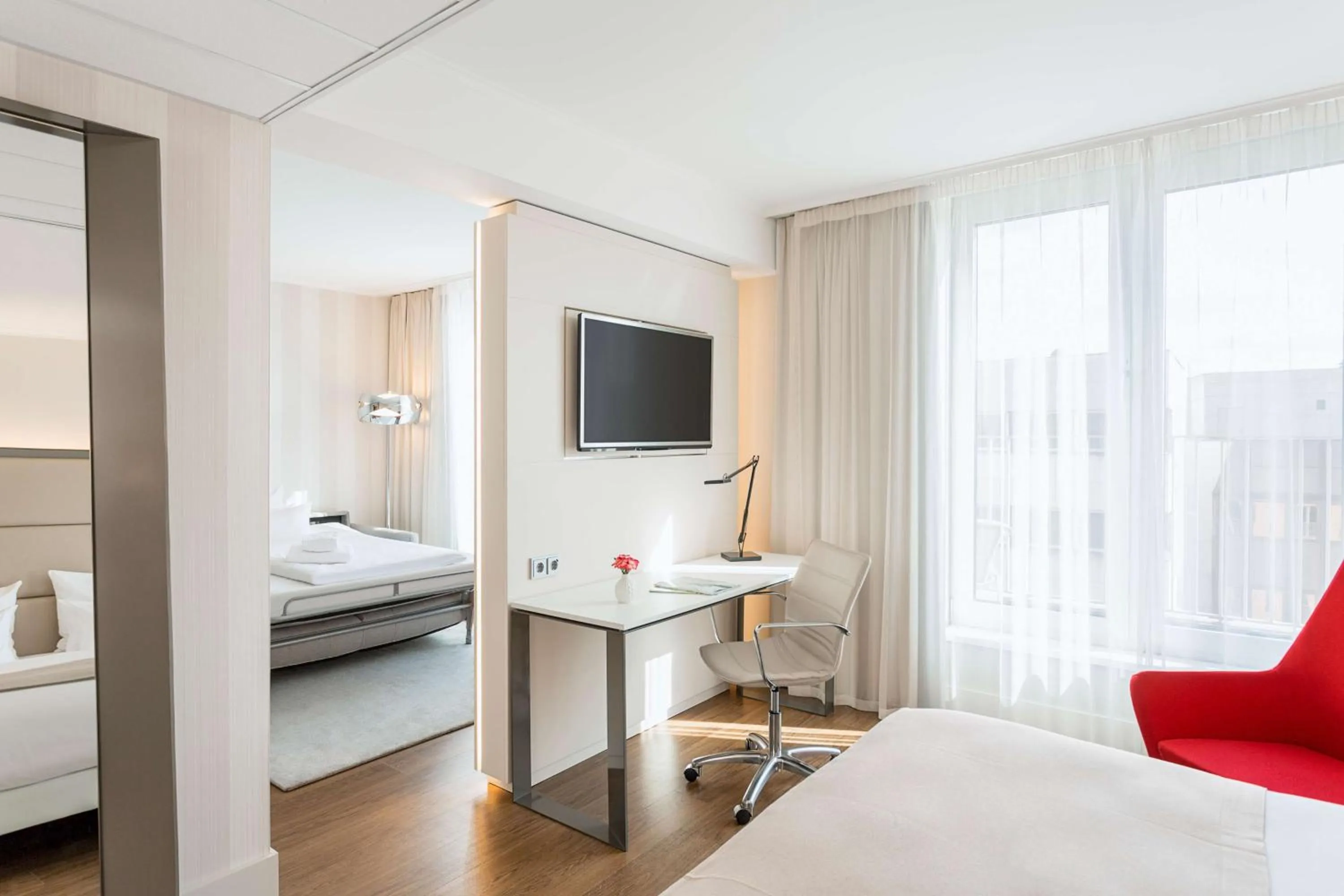 Family Room with Terrace (3 Adults + 1 Child) in NH Collection Berlin Mitte am Checkpoint Charlie
