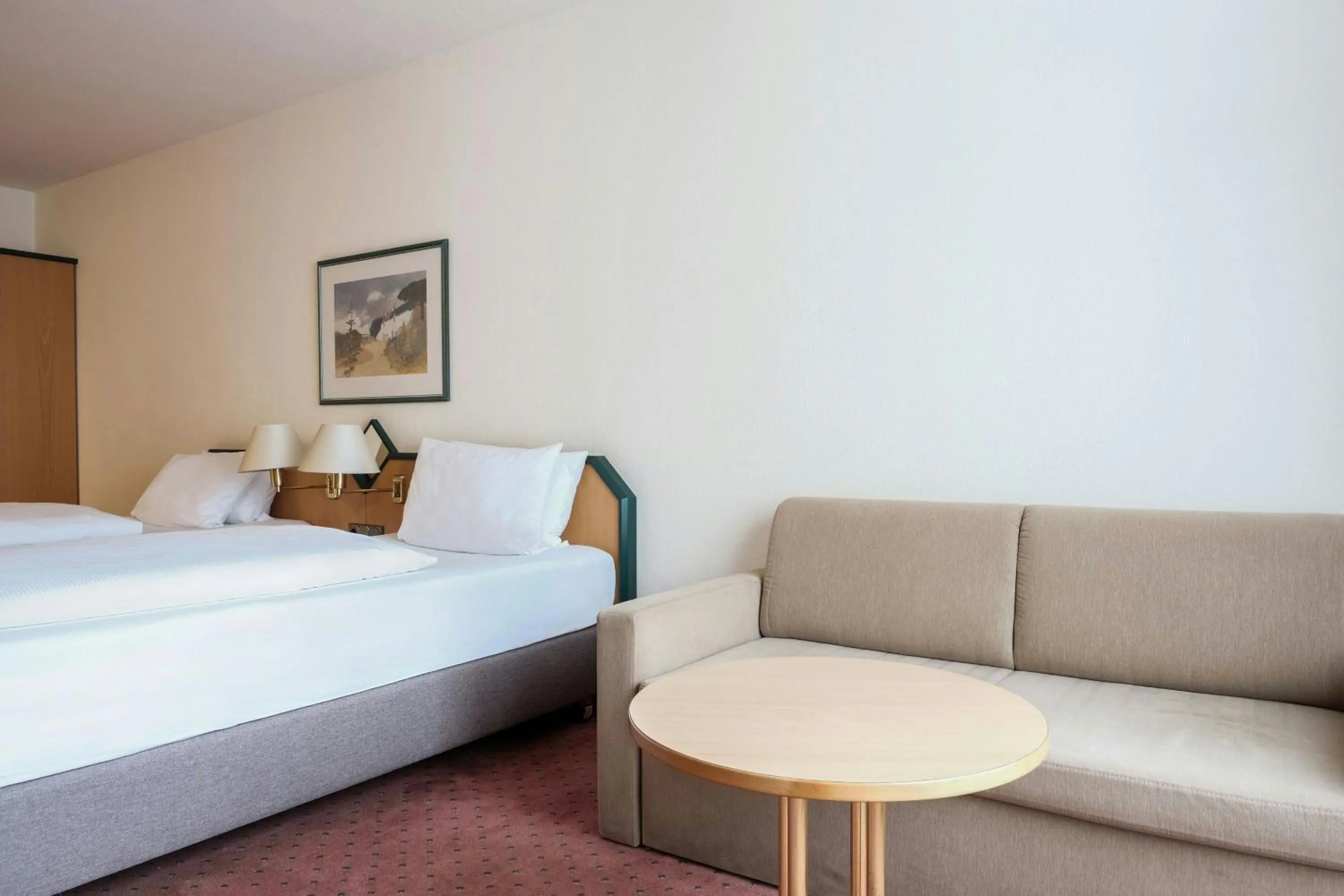 Lounge or bar, Bed in FOUR Essen City Centre