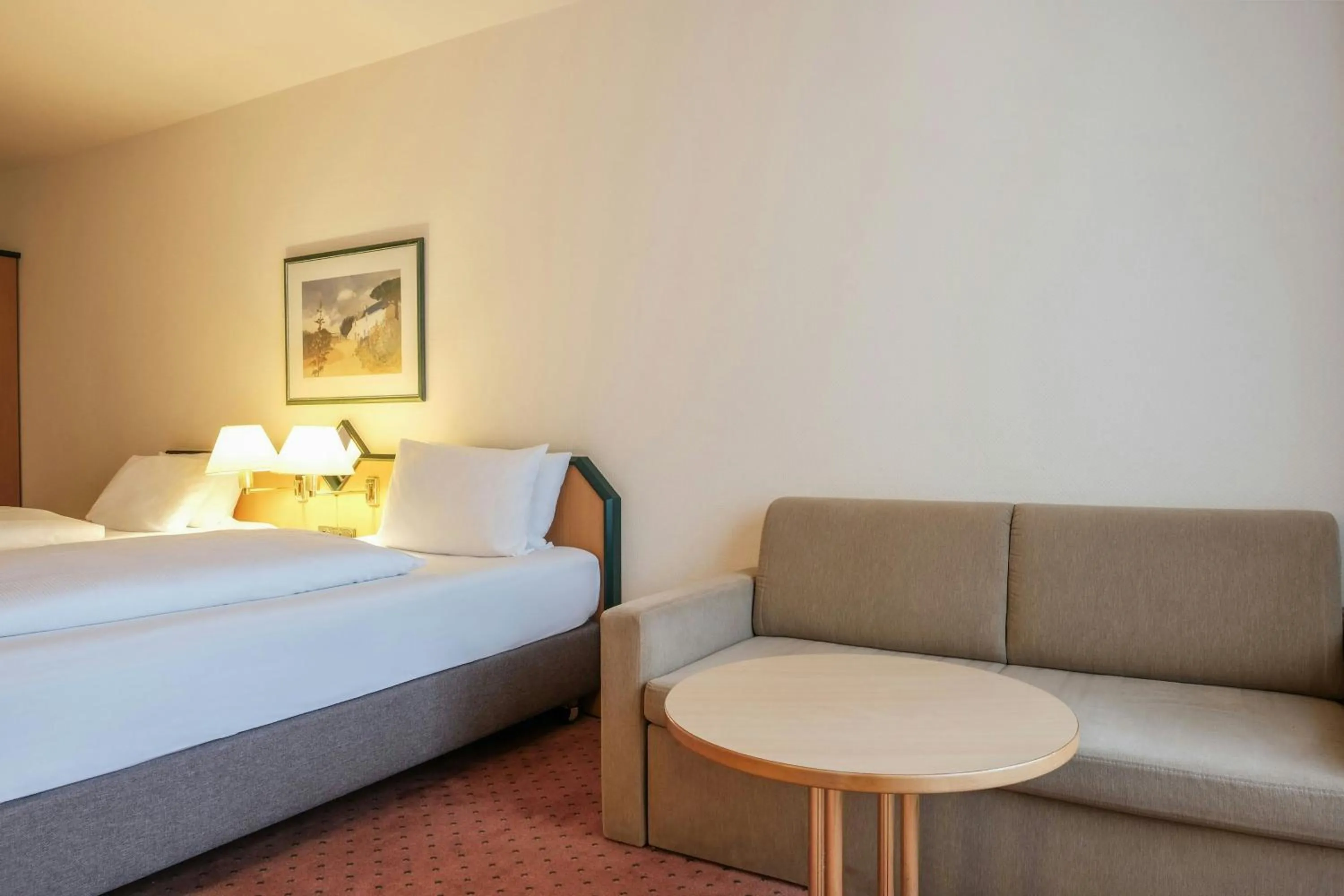 Lounge or bar, Bed in FOUR Essen City Centre