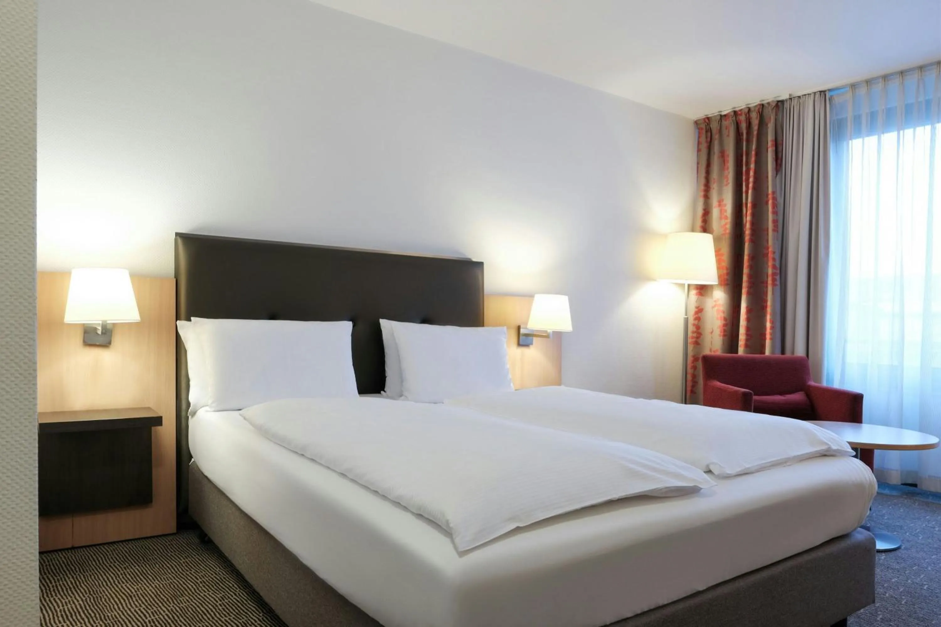 Photo of the whole room, Bed in FOUR Essen City Centre