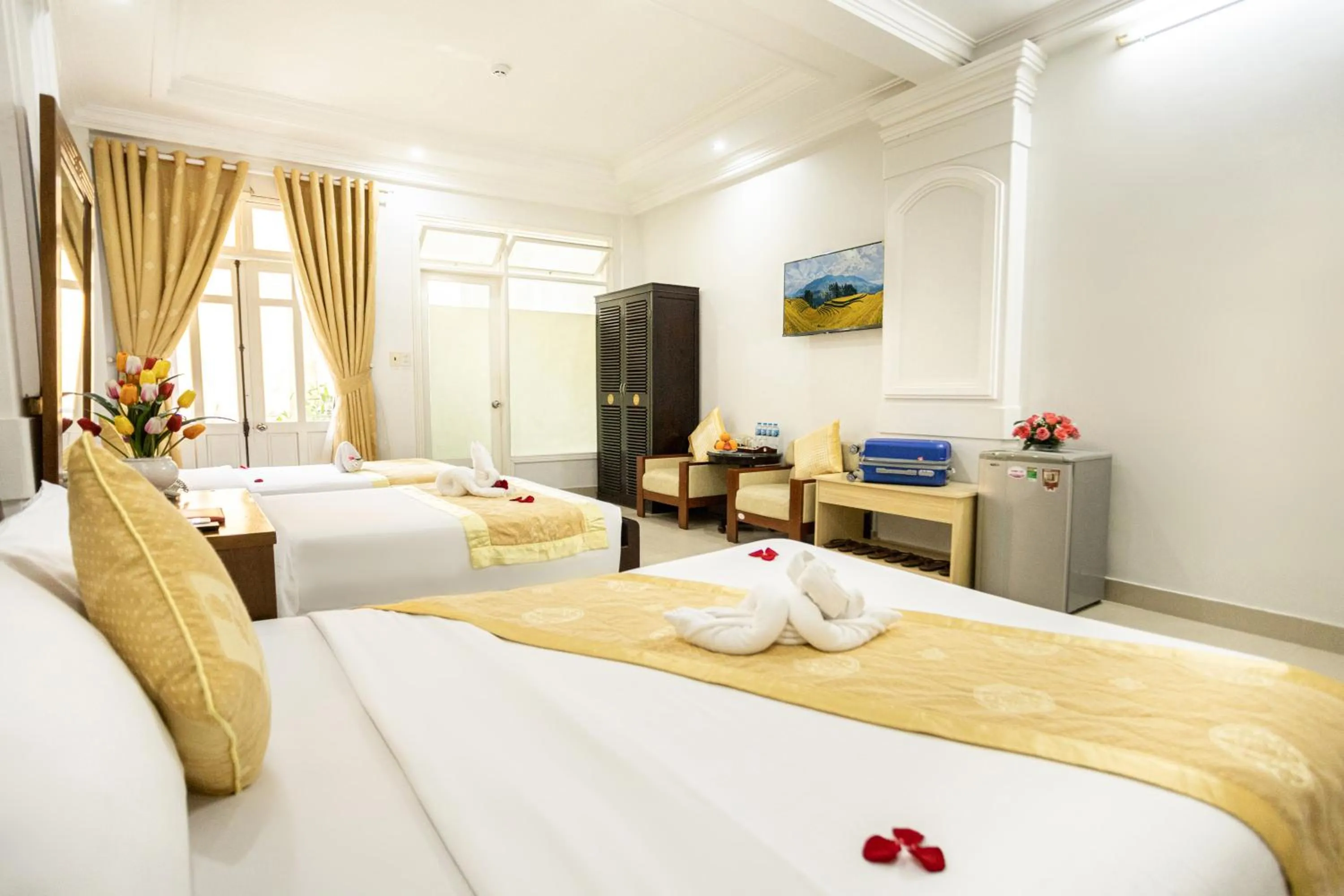 Deluxe Quadruple Room in Hue Harmony Hotel