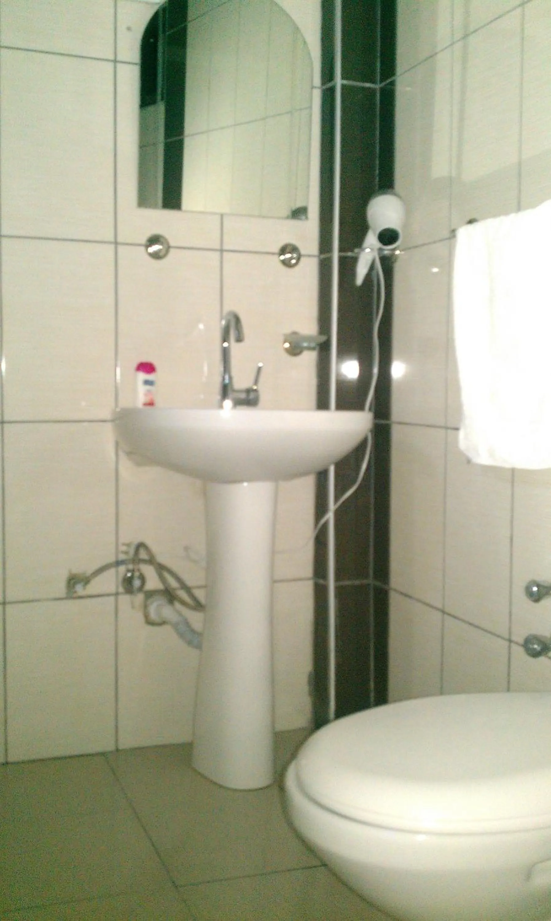 Economy Quadruple Room with Shared Bathroom in Anatolia Hotel