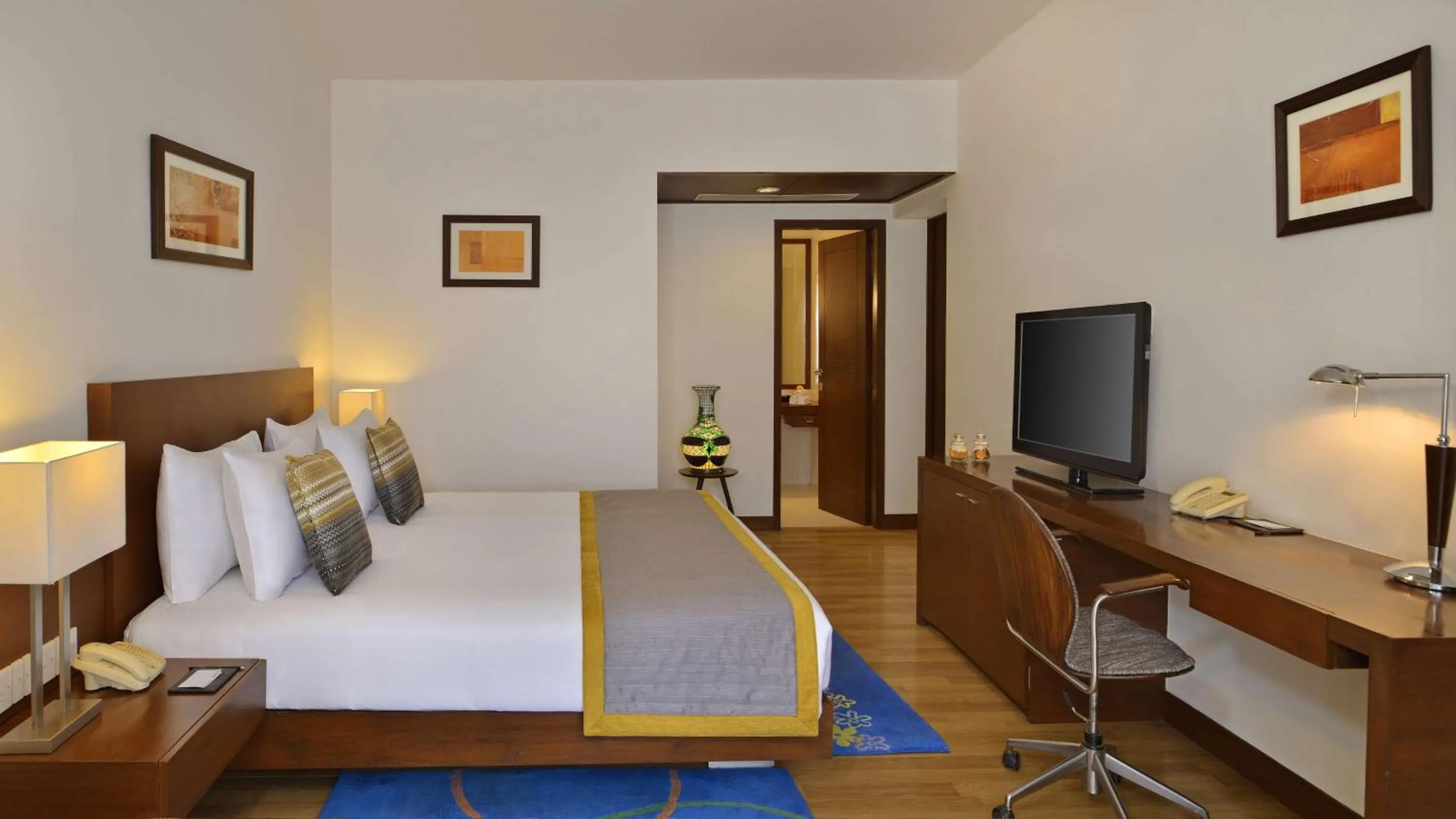 Deluxe Suite With Complimentary One Way Airport/Railway Station Transfer in Radisson Jass Hotel, Khajuraho