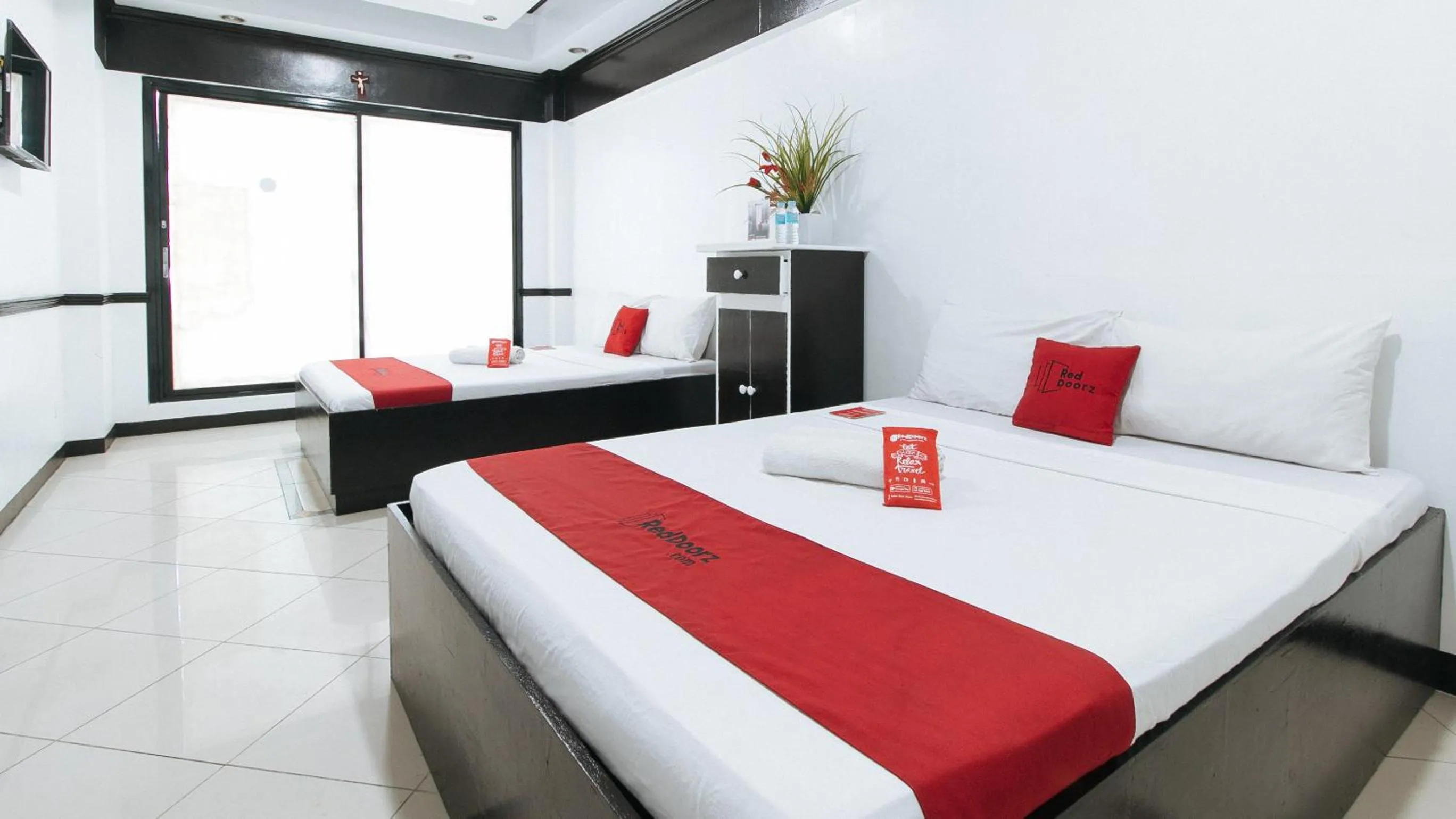 Quadruple Room in RedDoorz Plus at Villa Gloria Taguig