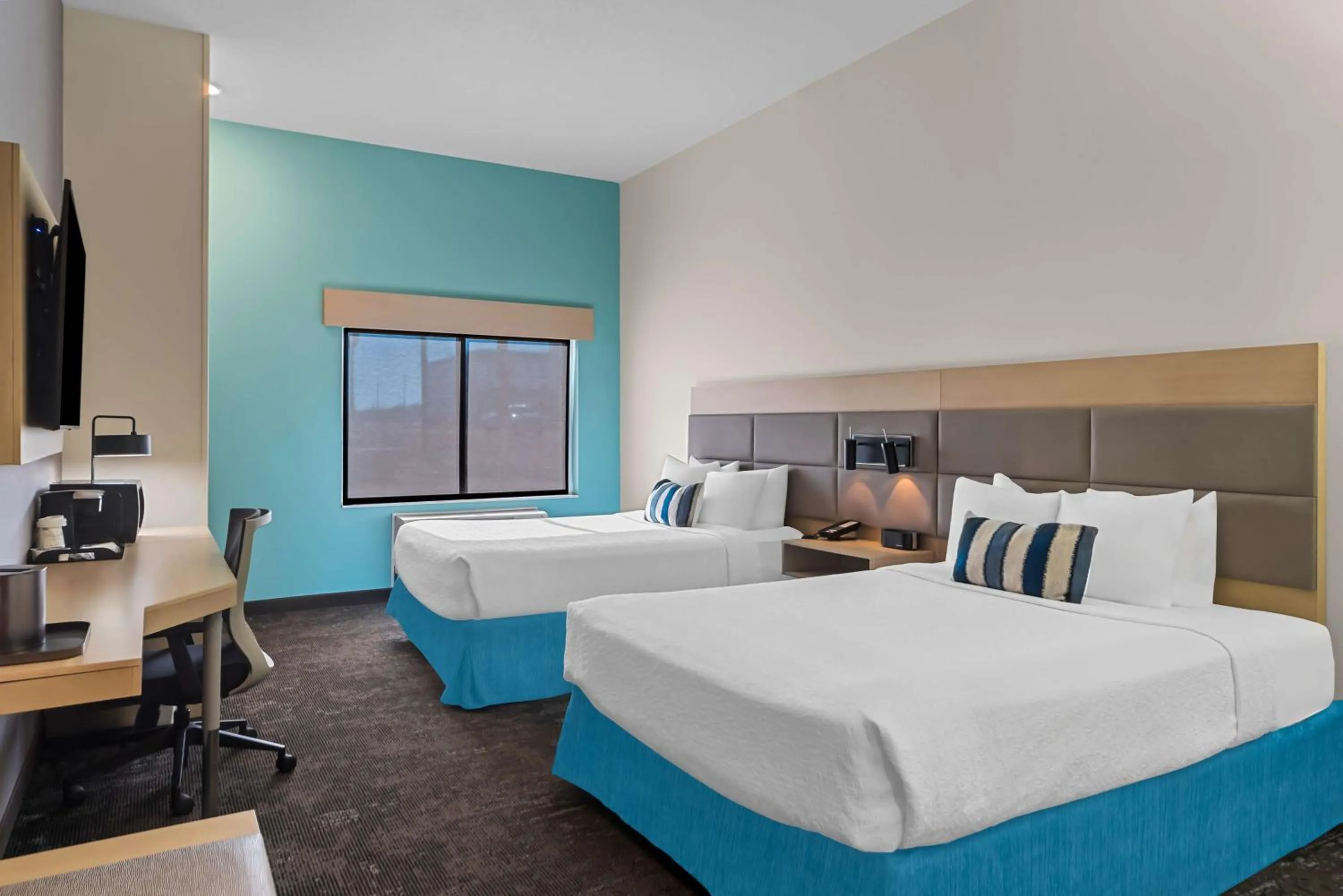 Queen Room with Two Queen Beds and Mobility Accessible Roll-In Shower in Best Western Plus Ogallala Inn