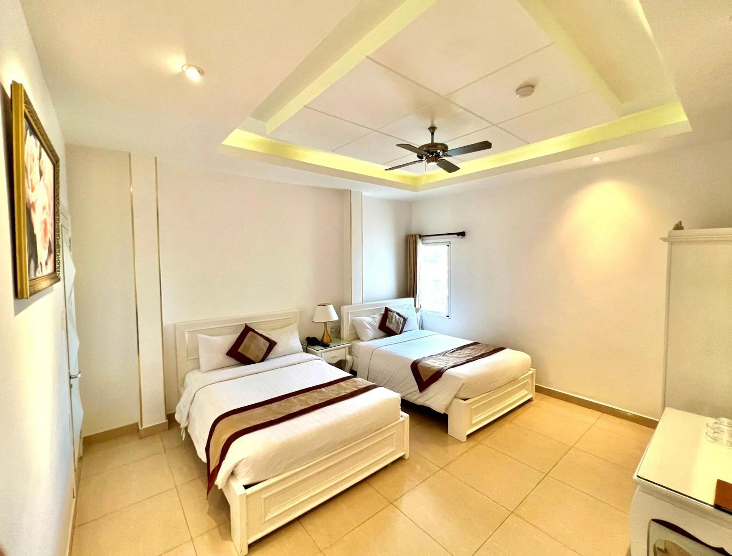 Deluxe Quadruple Room in Tulip Hotel