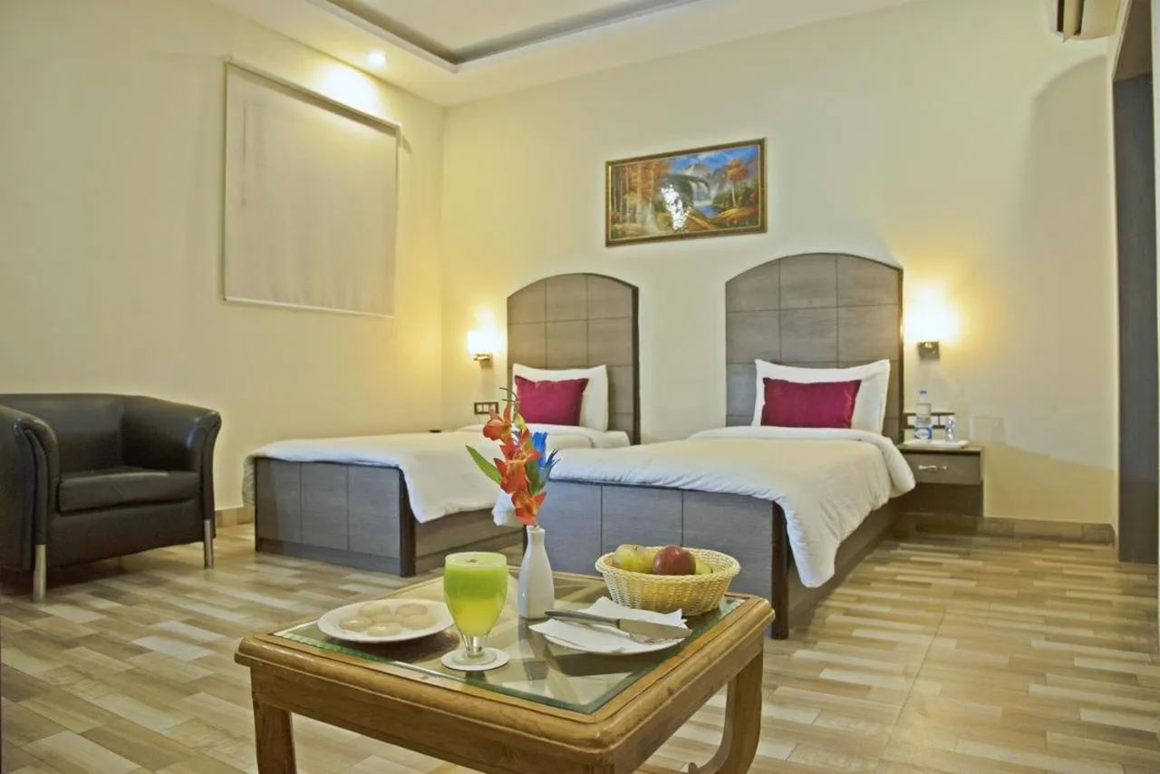 Executive Triple Room in Spring Sky Mughalsarai By ShriGo Hotels