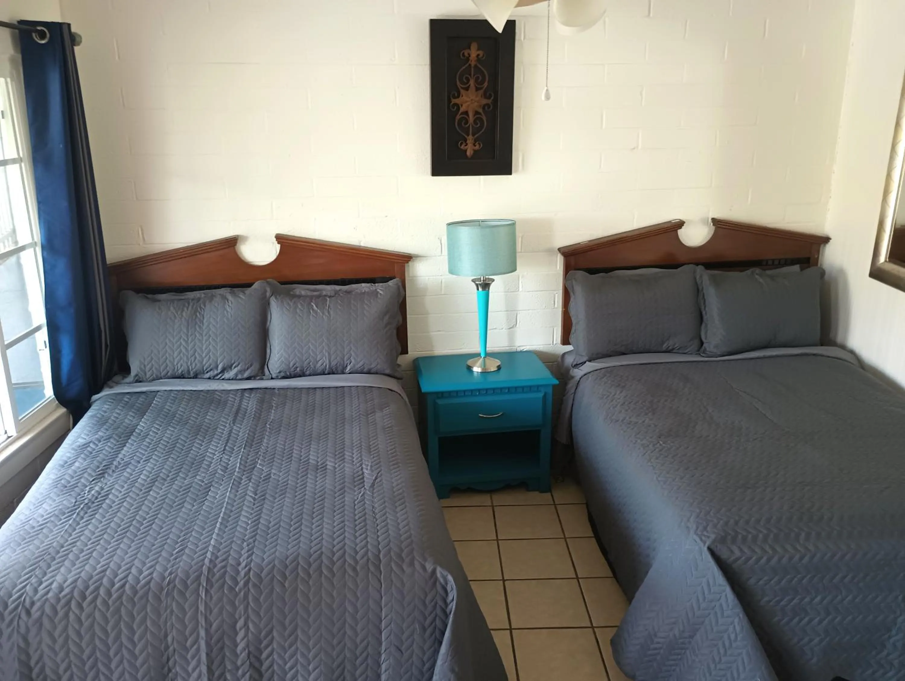 Queen Room with Two Queen Beds and Kitchen in Oceana Boutique Hotel