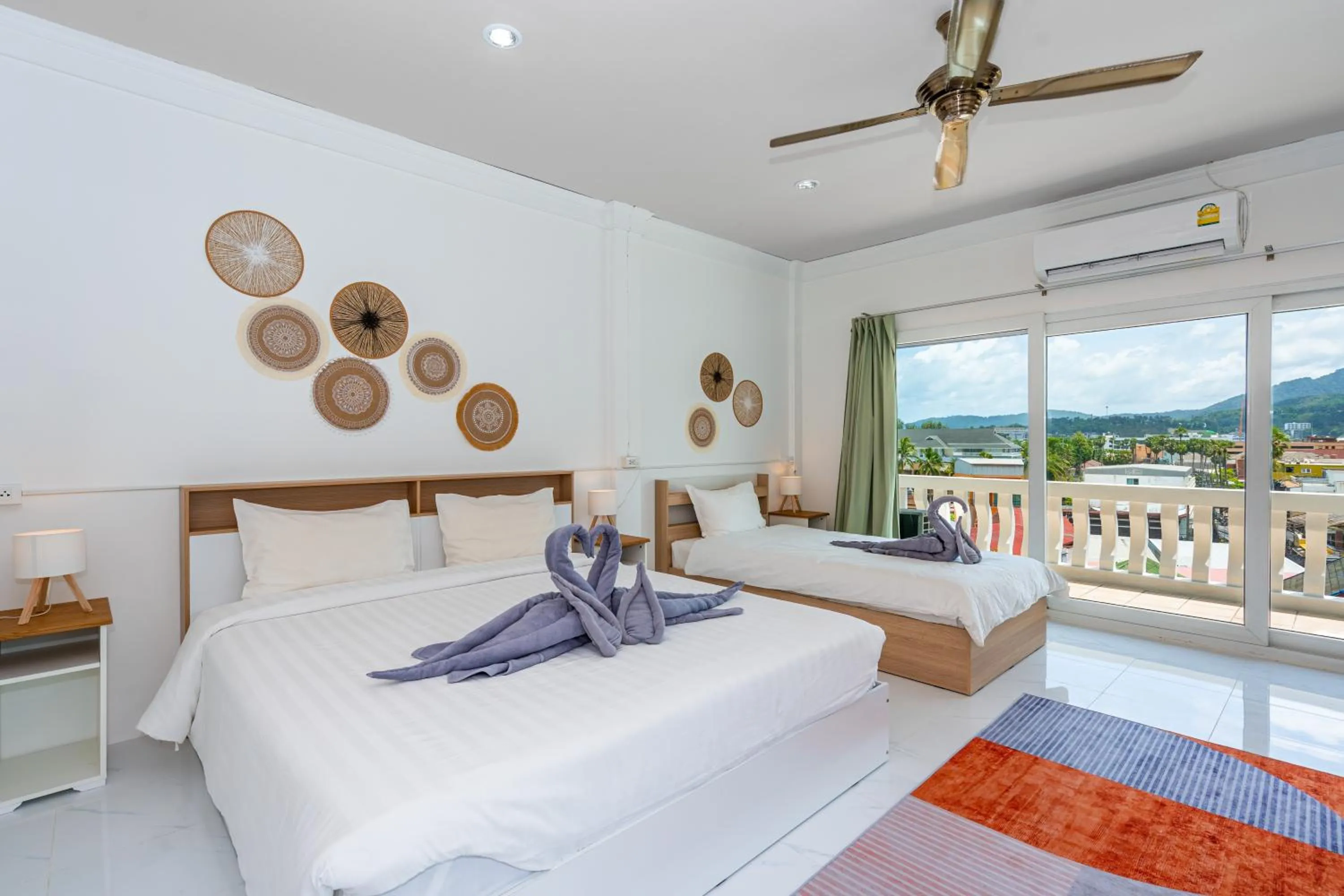 Family Triple Room with pool and sea view  in Kata Hill Sea View Hotel