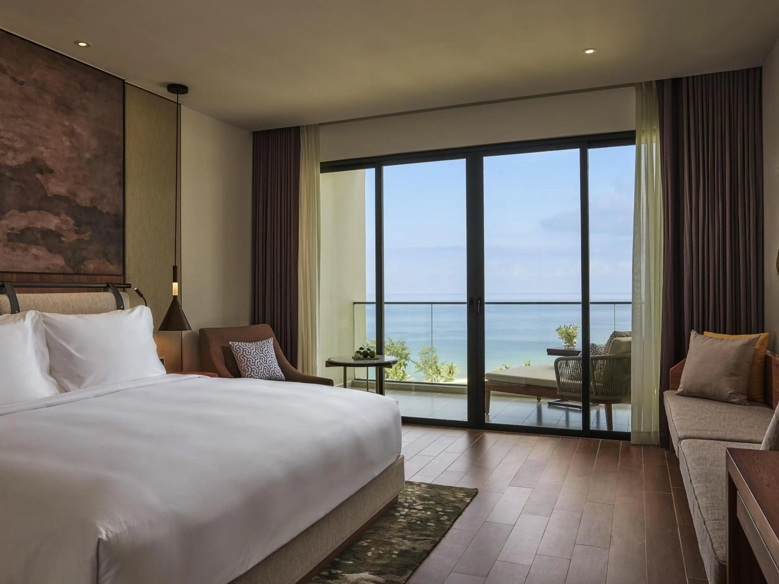 Superior King Room with Balcony and Sea View in Mövenpick Resort Waverly Phu Quoc