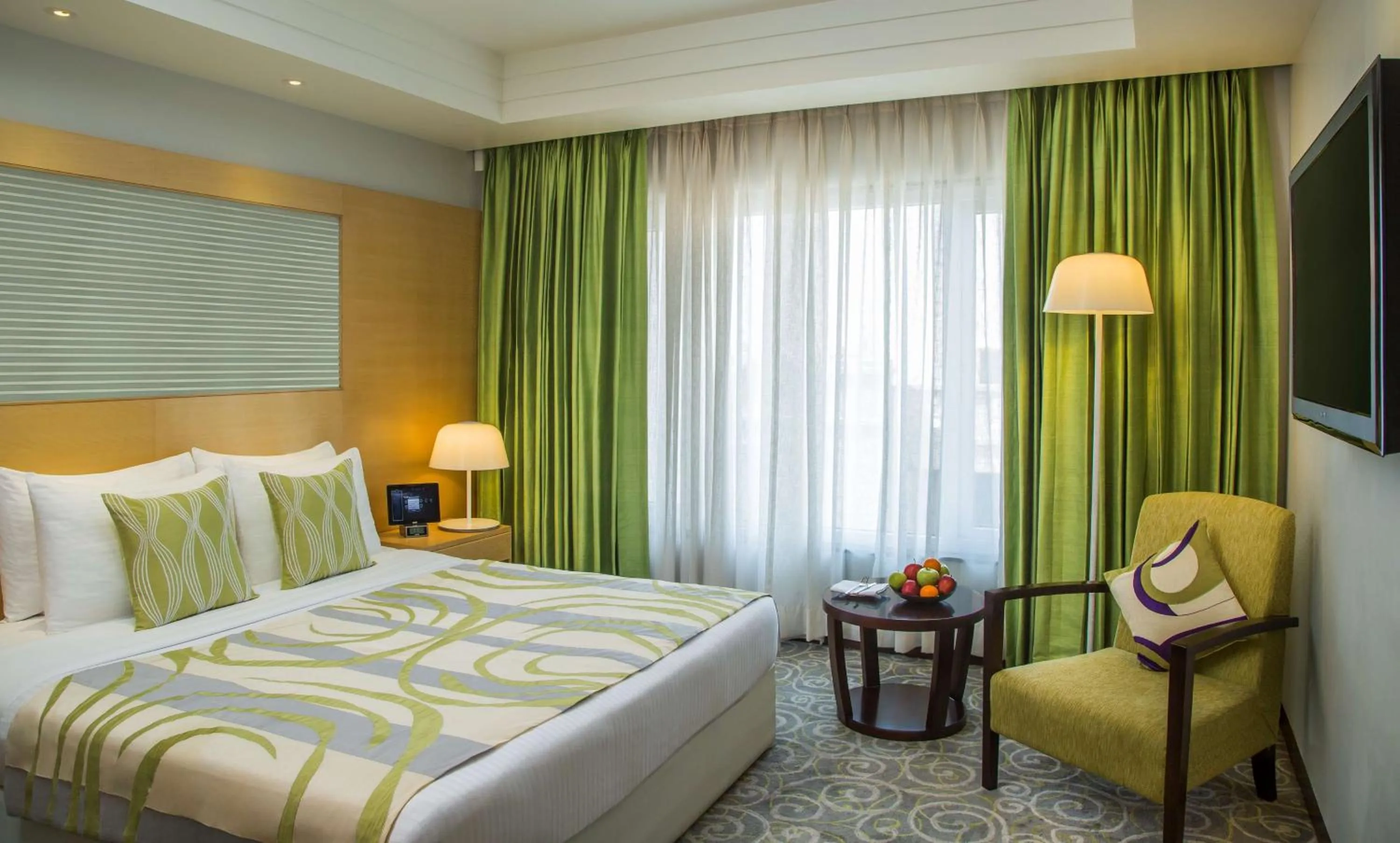 Business Class Suite – Two Ways Airport Transfers, 2 pcs of Laundry (per day), 1 Round Tea/Coffee with cookies at Sky Bistro (1700 to 1900 hrs) - single occupancy in Radisson Blu Hotel Ahmedabad