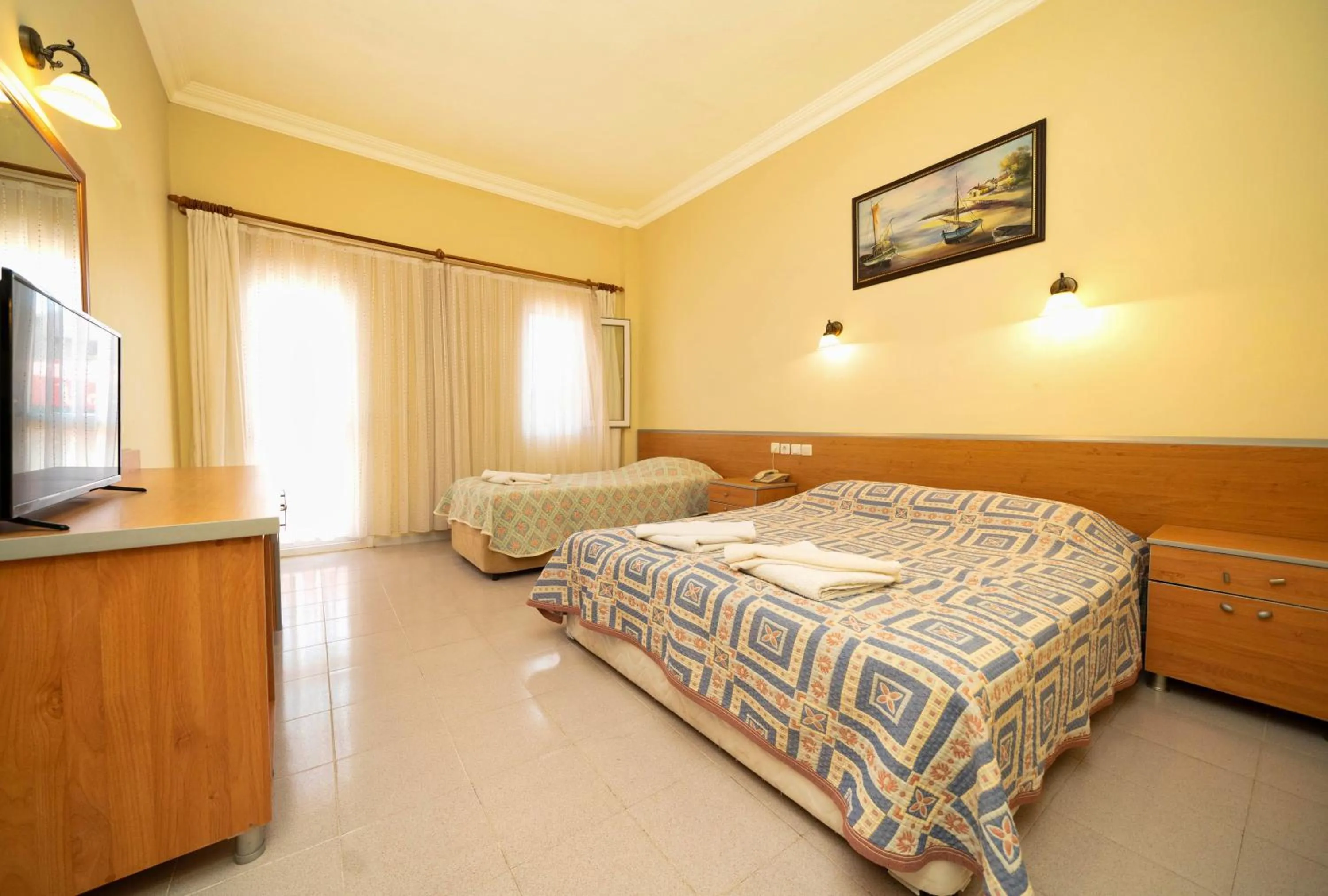 Standard Triple Room in Hotel Imparator