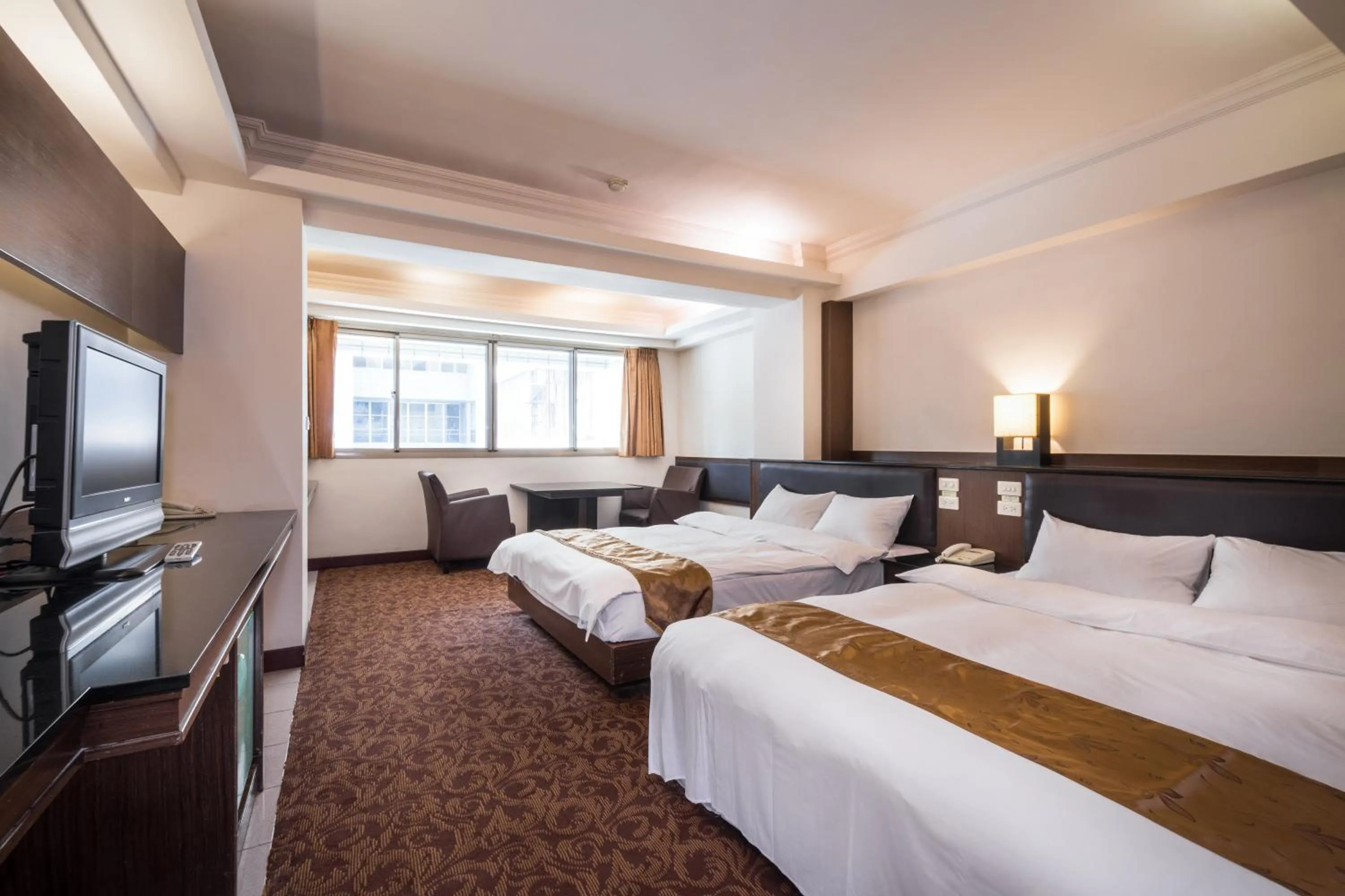 Deluxe Quadruple Room in The Enterpriser Hotel