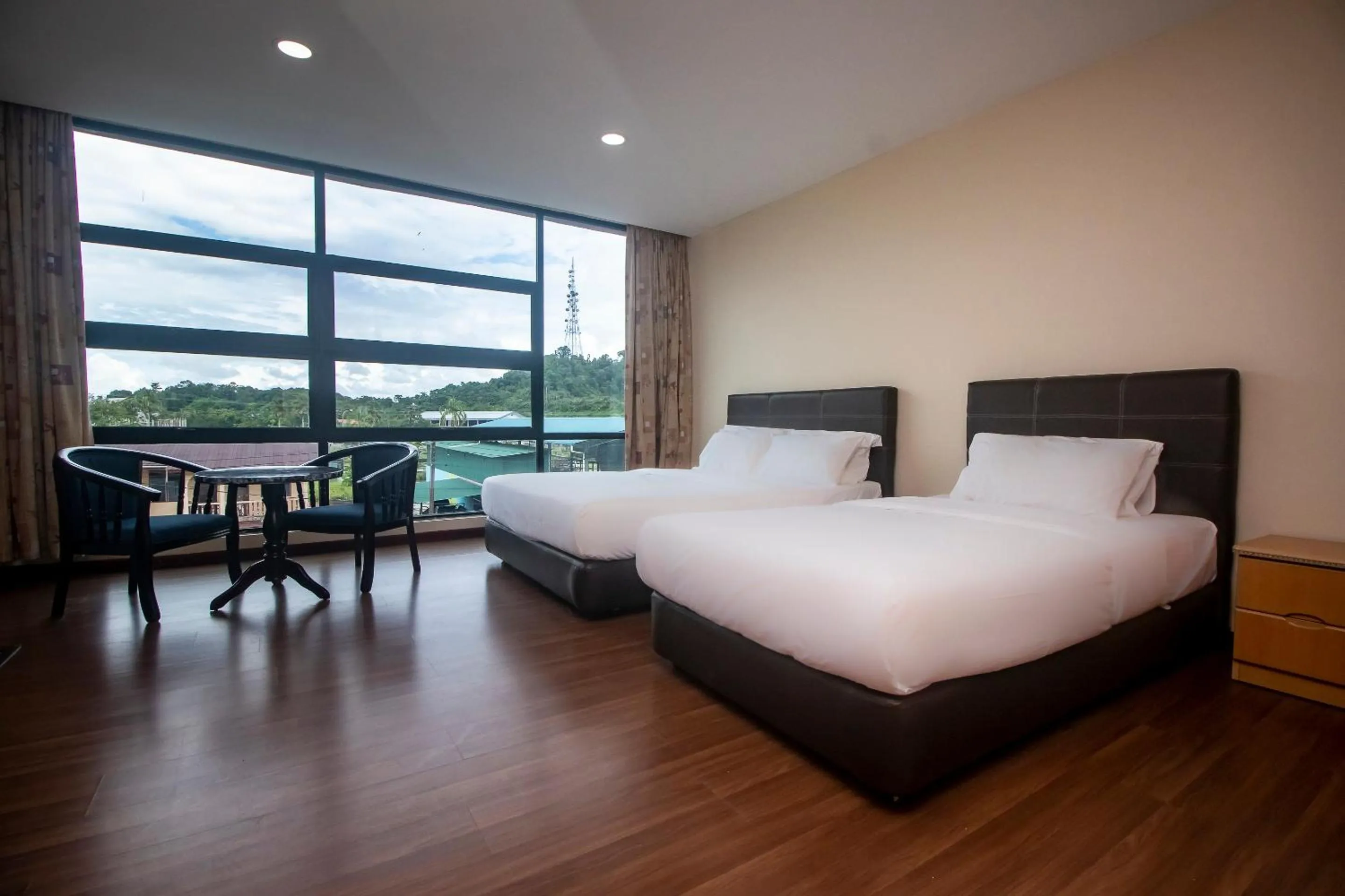 Deluxe Triple Room in Hotel O Ltk Home