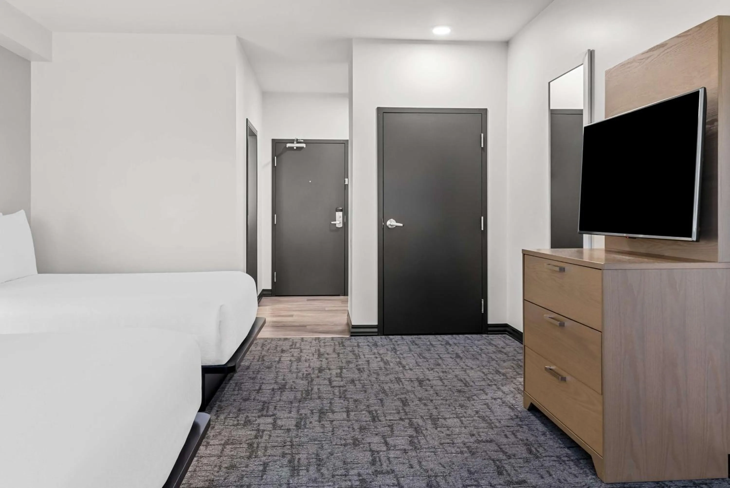 Queen Suite with Two Queen Beds with Sofa Bed in Best Western Plus Winkler