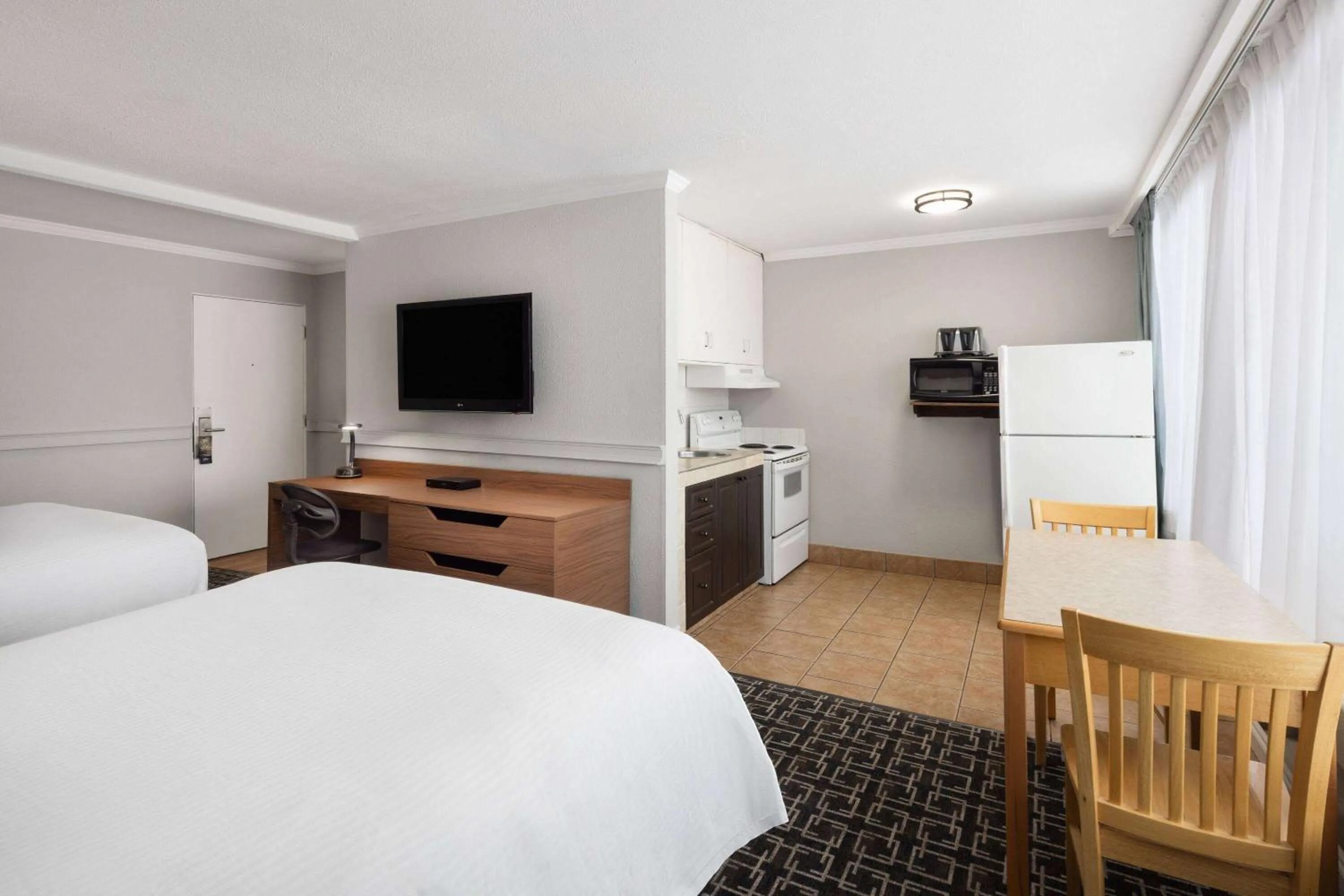 Deluxe Queen Room with Two Queen Beds - Non-Smoking in Baymont by Wyndham Edson