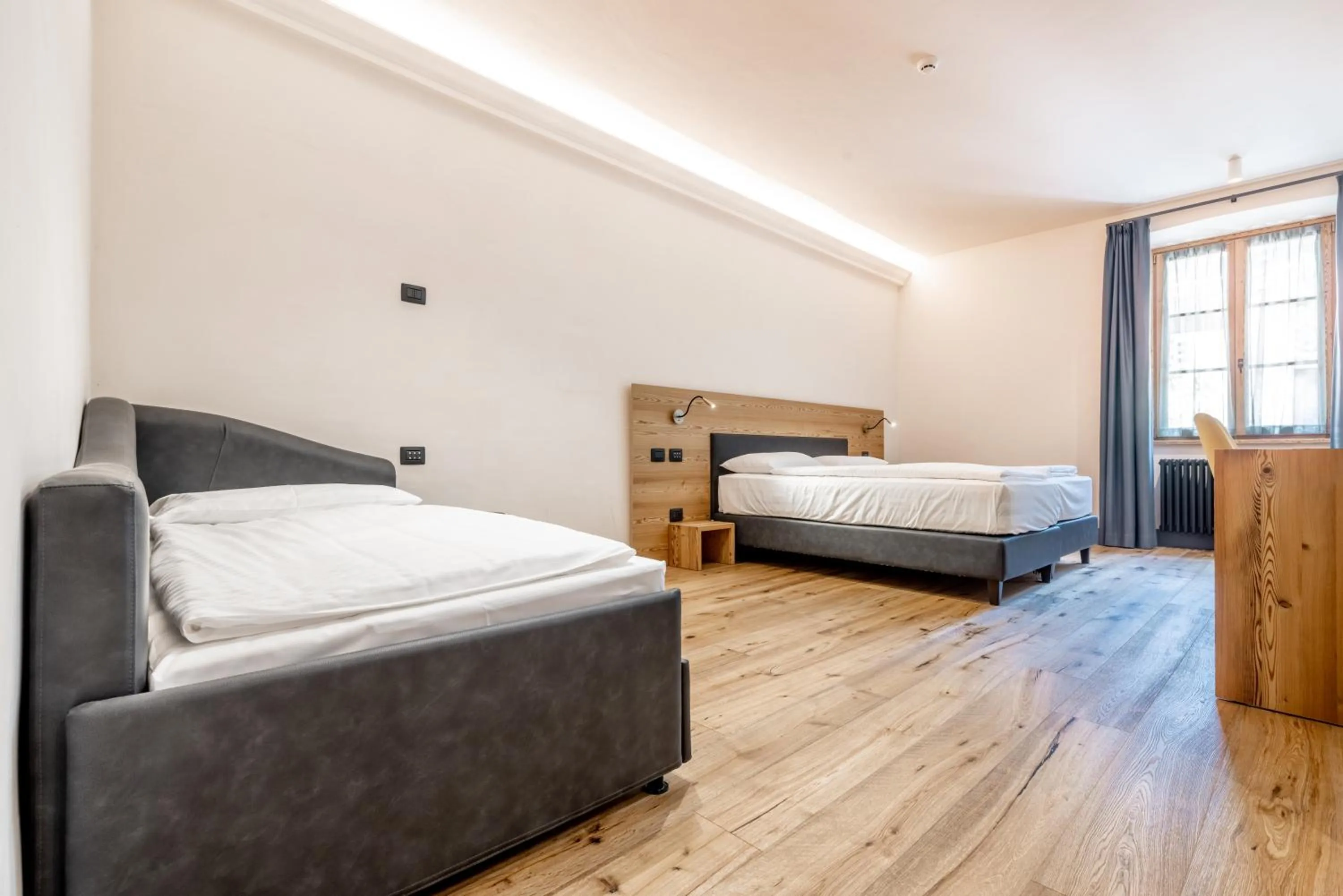 Comfort Triple Room in Curt di Clement Eco Mobility Hotel