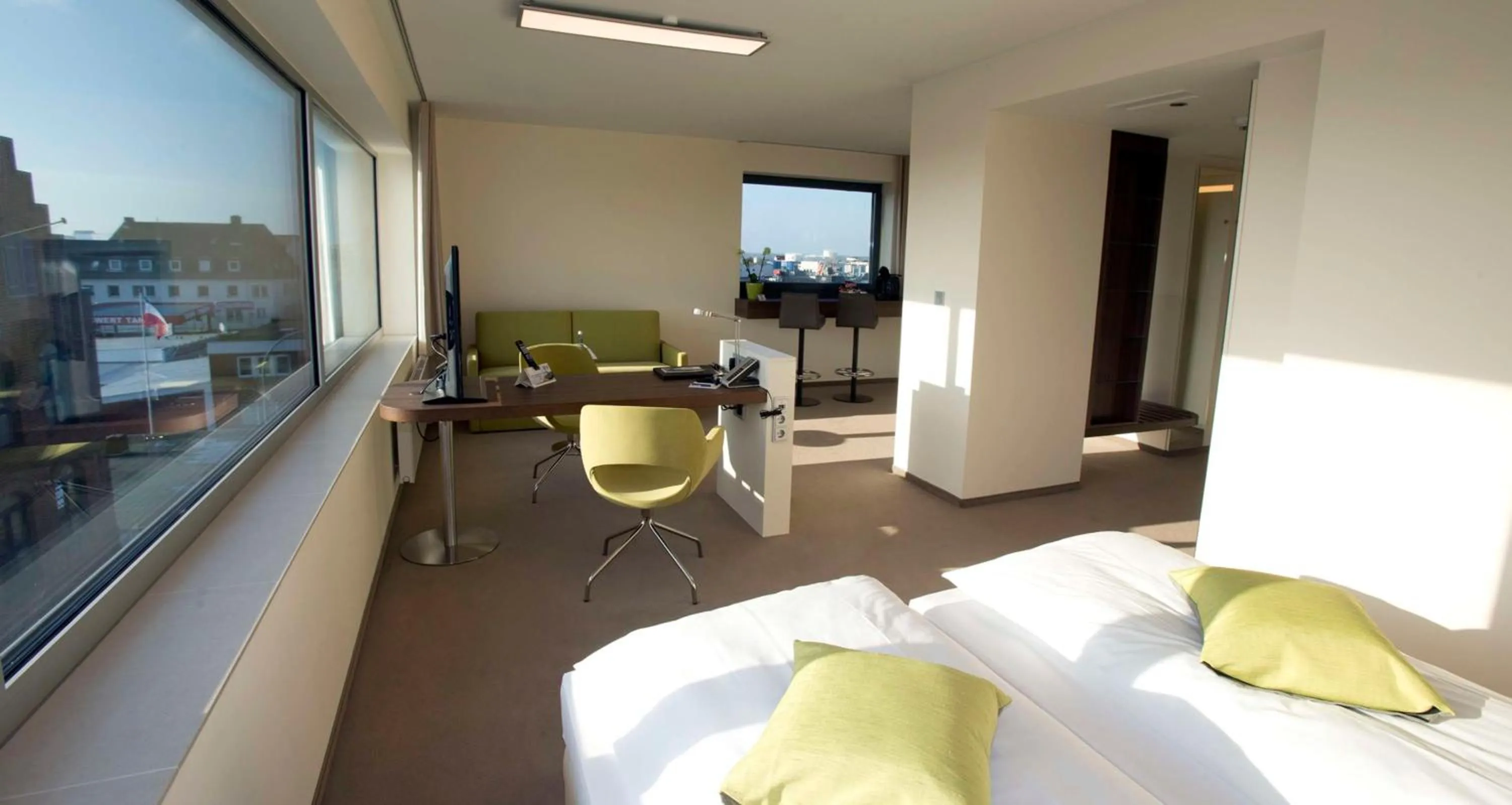 Suite with Two Single Beds and Sofa Bed in Best Western Plus Hotel Bremerhaven