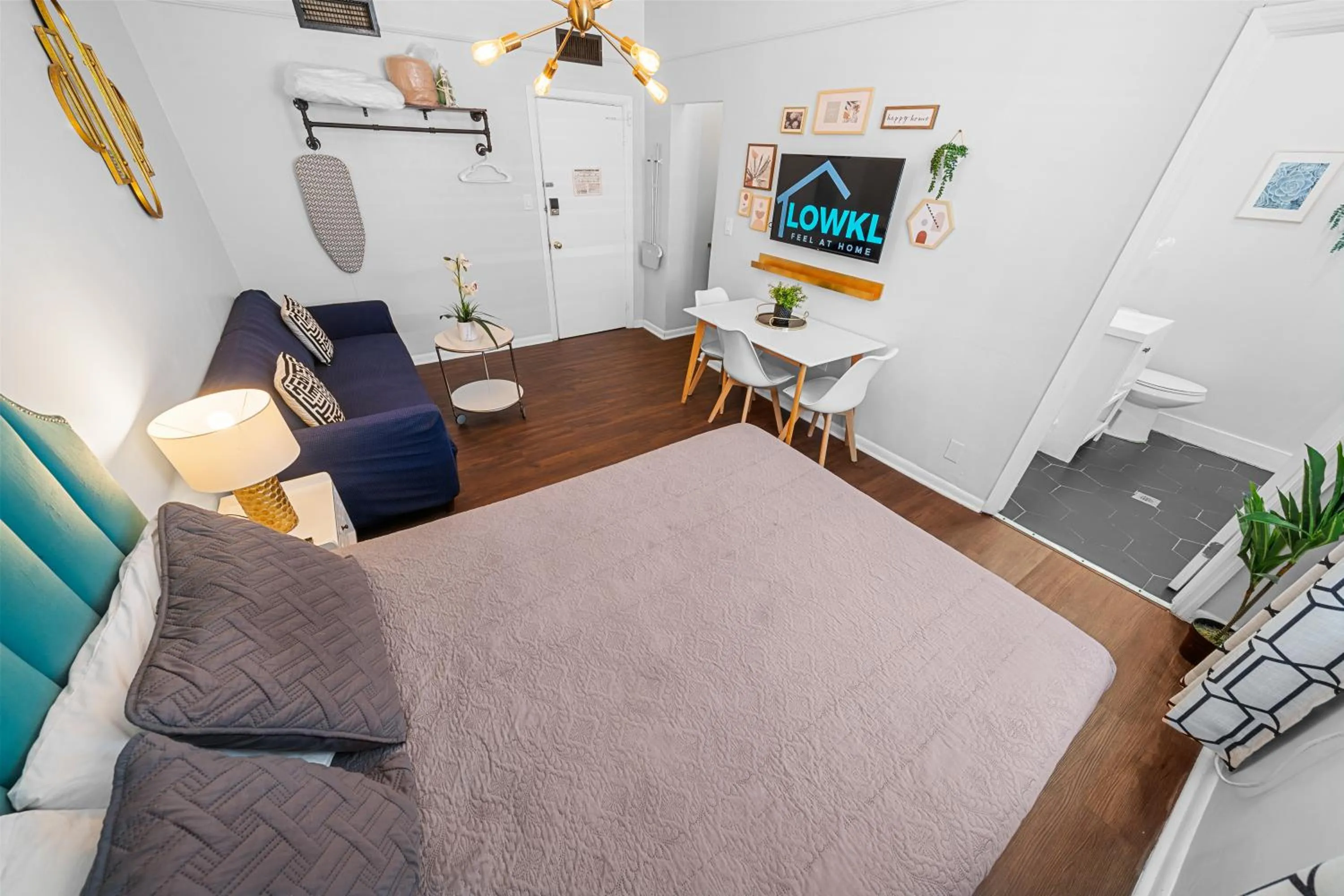 Superior Queen Studio with Kitchenette and Futon in Nine20 Collins Apartments by Lowkl