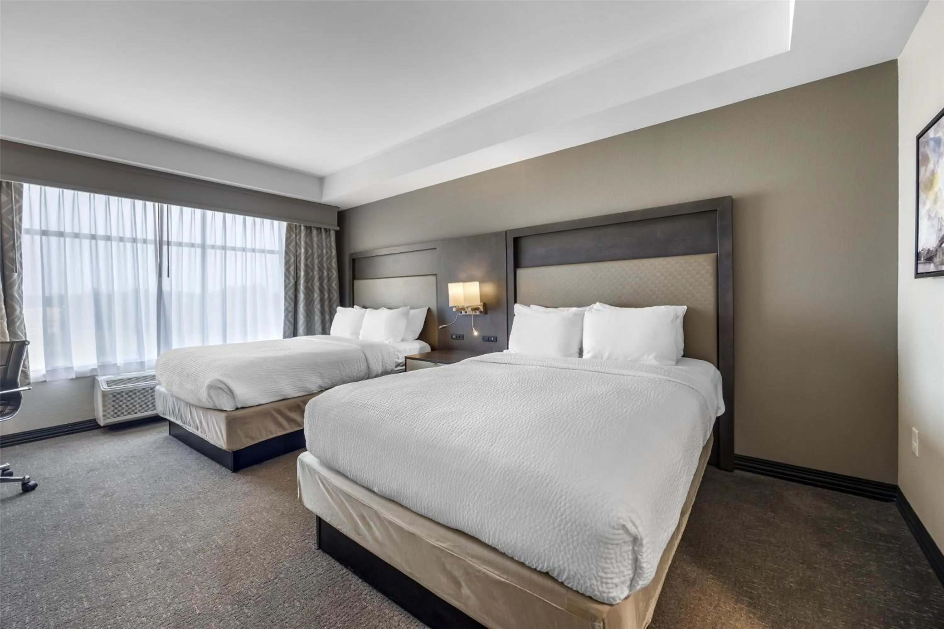 Queen Room with Two Queen Beds and Kitchen in Best Western Plus Executive Residency Jackson Northeast