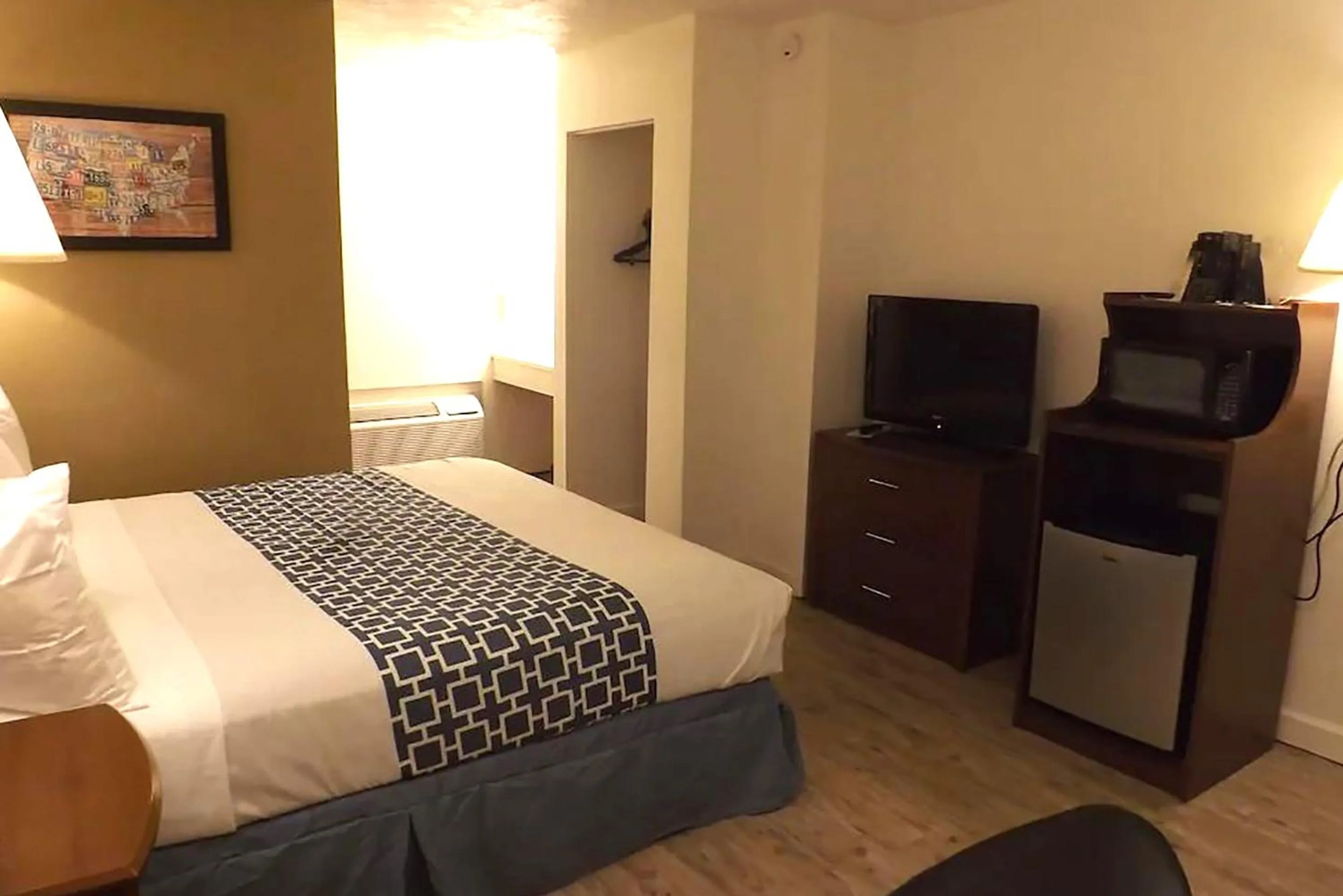 King Room - Disability Access in Coratel Inn & Suites by Jasper McCook