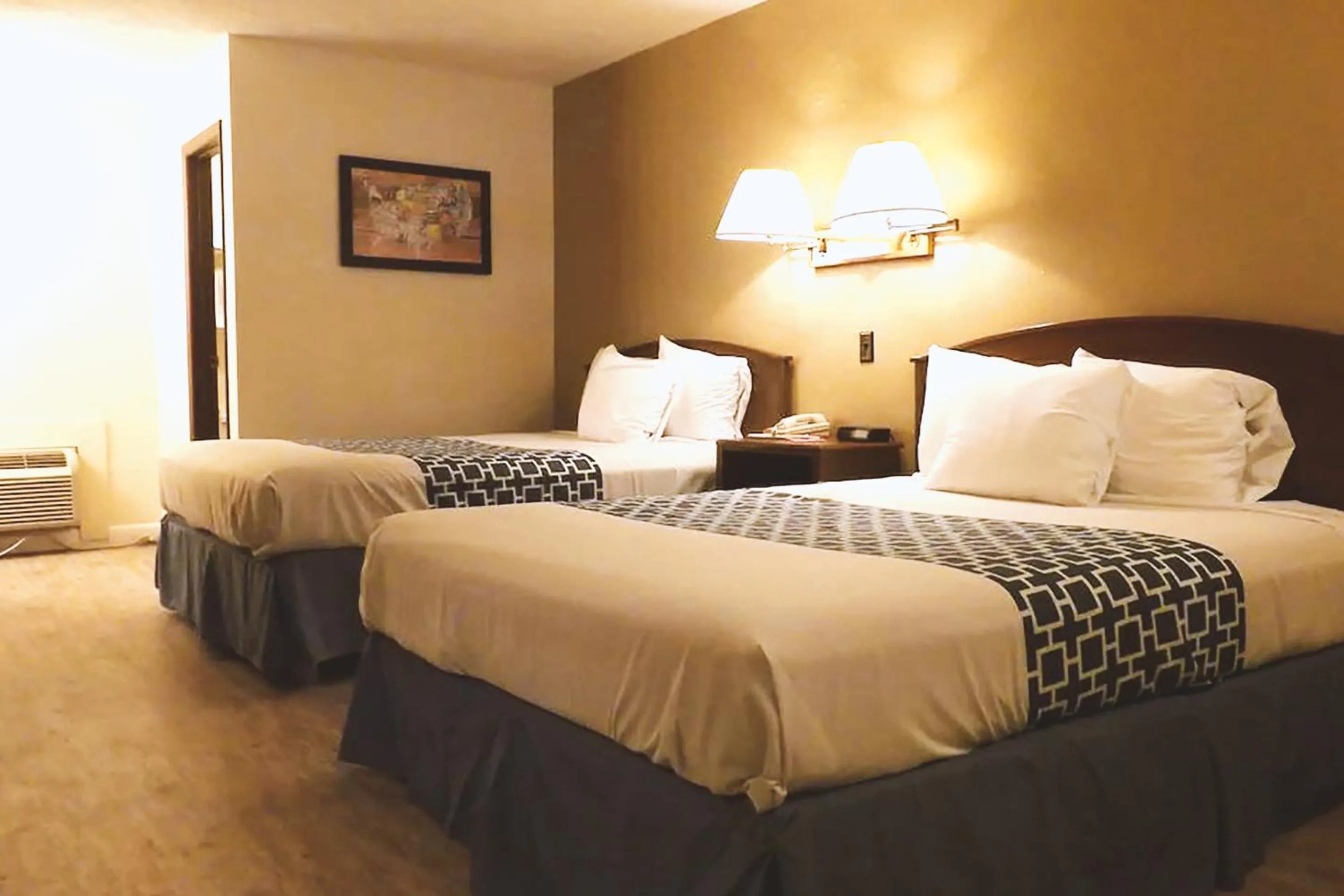 Deluxe Family Suite in Coratel Inn & Suites by Jasper McCook
