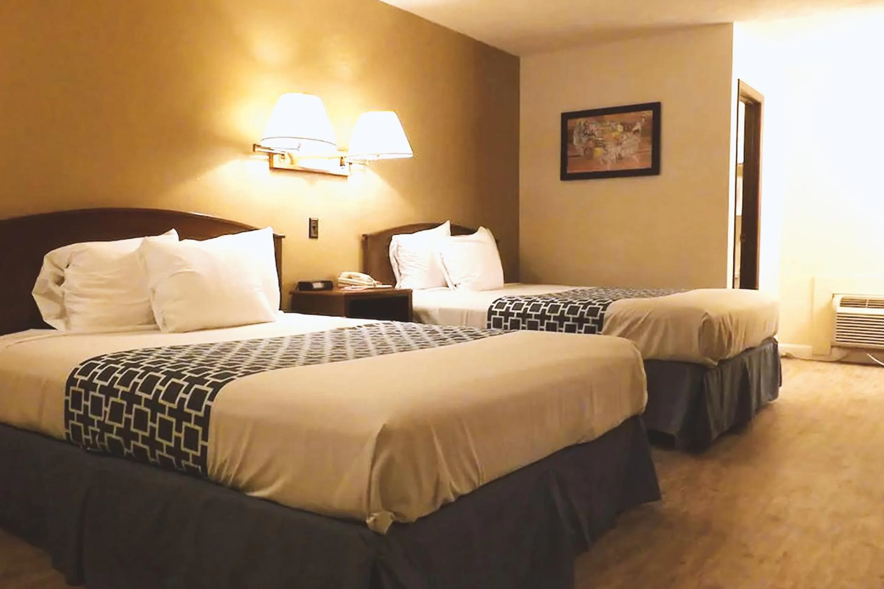Standard Queen Room with Two Queen Beds in Coratel Inn & Suites by Jasper McCook