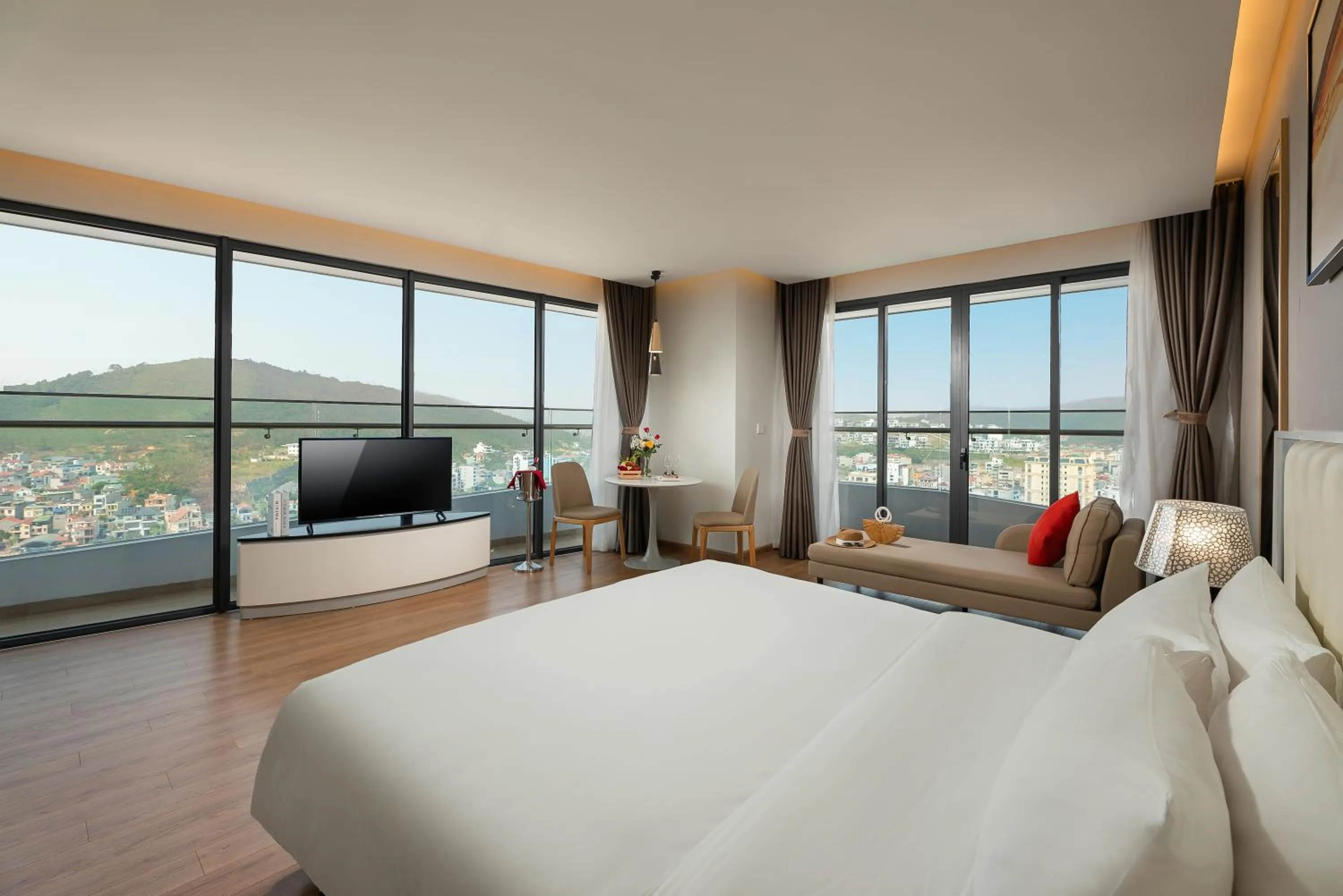 Premium King Bed Lake View With Balcony in DeLaSea Ha Long Hotel - Modern Bayview Escape