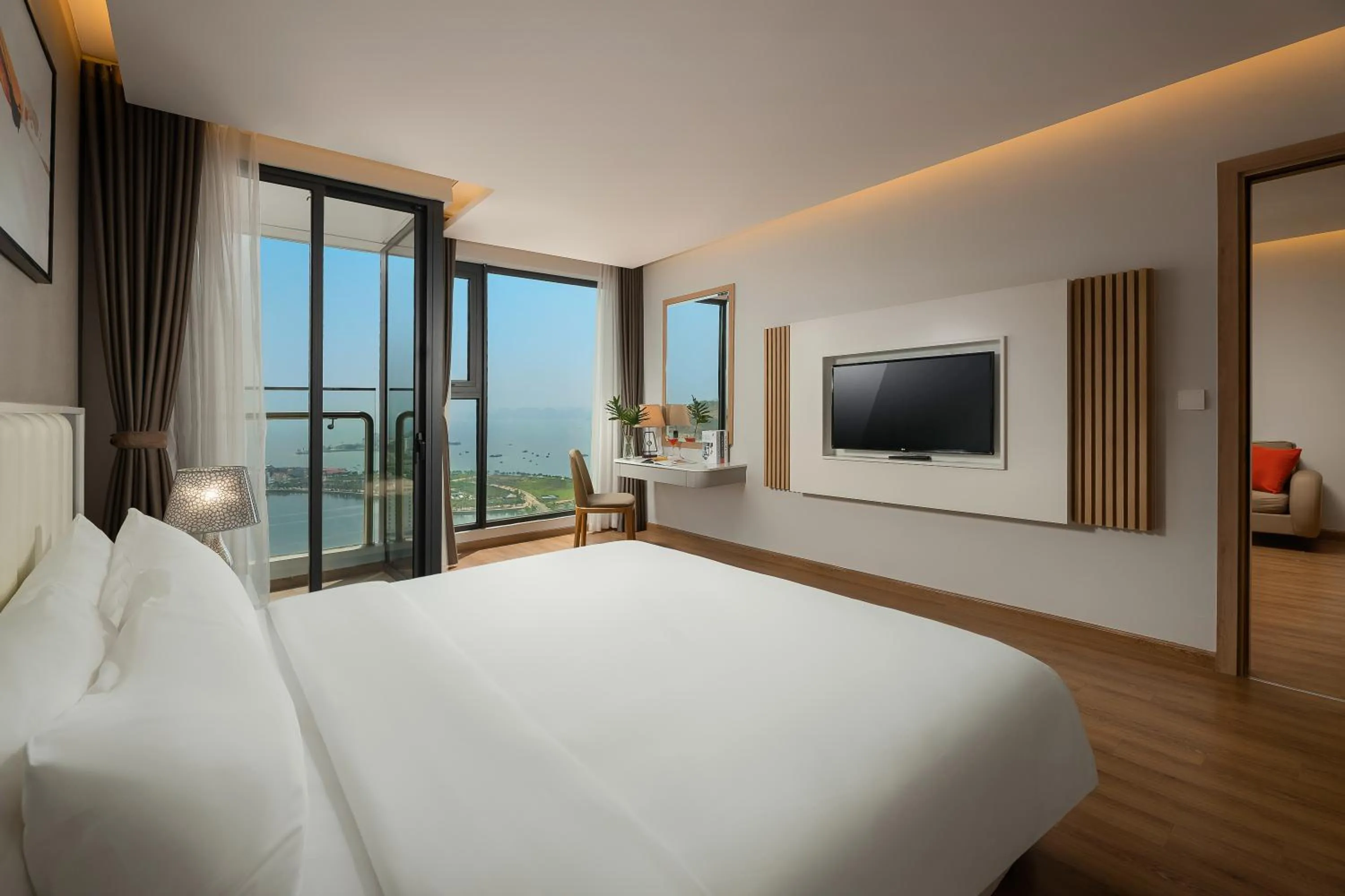 Executive Suite King Bed Ocean View With Balcony in DeLaSea Ha Long Hotel - Modern Bayview Escape