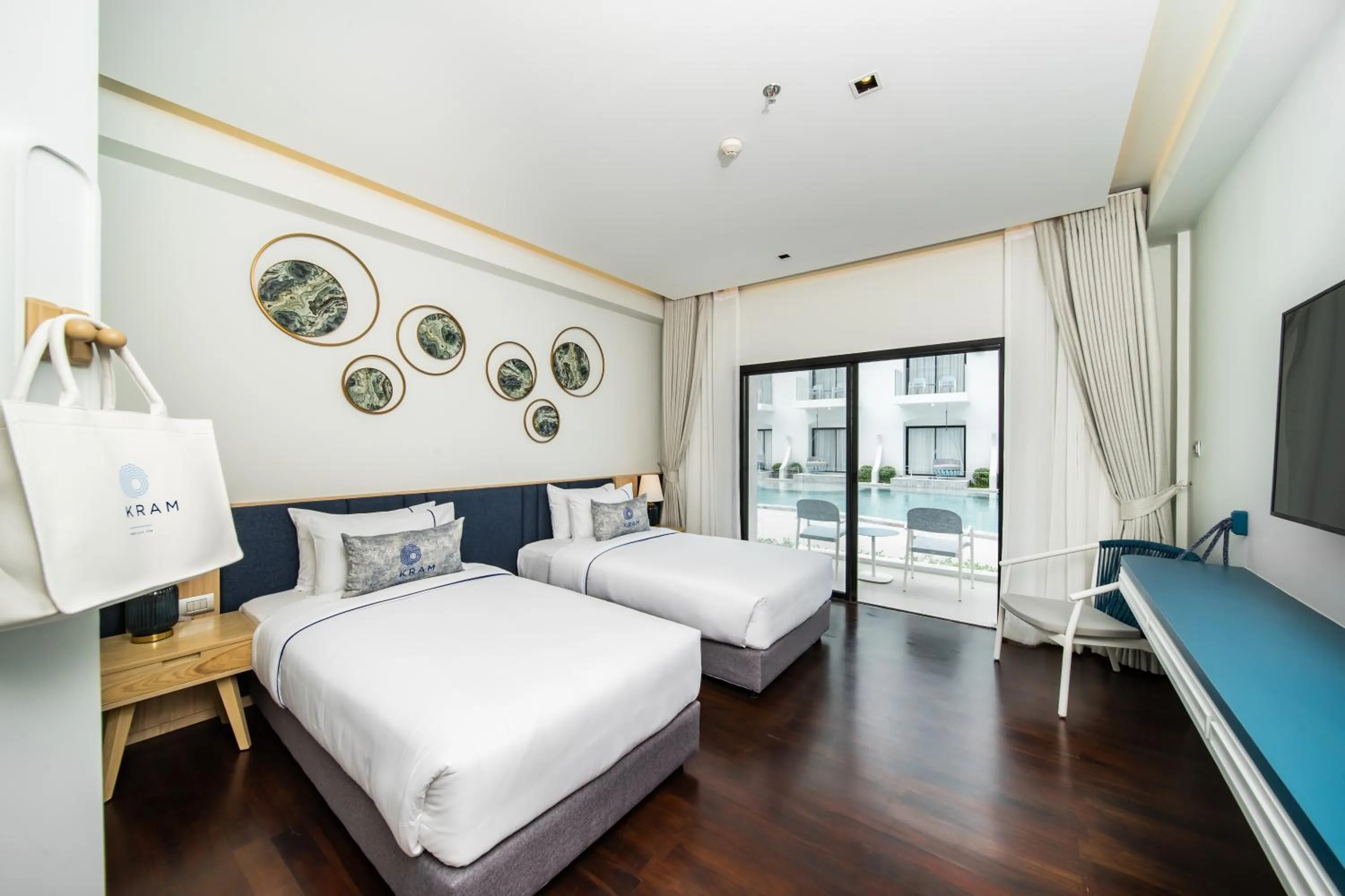 Deluxe Twin Bed with Pool View in Kram Pattaya