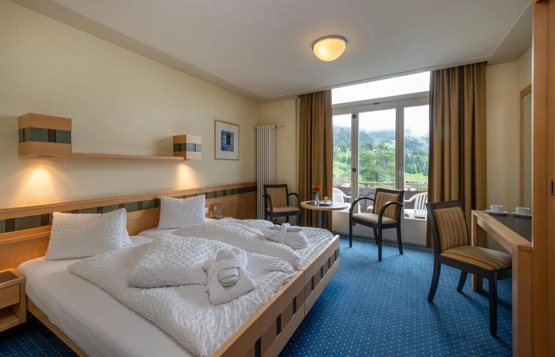 Double Room with Balcony (2 Adults + 1 Child) - single occupancy in Hotel Victoria Lauberhorn Wengen, a Faern Collection Hotel
