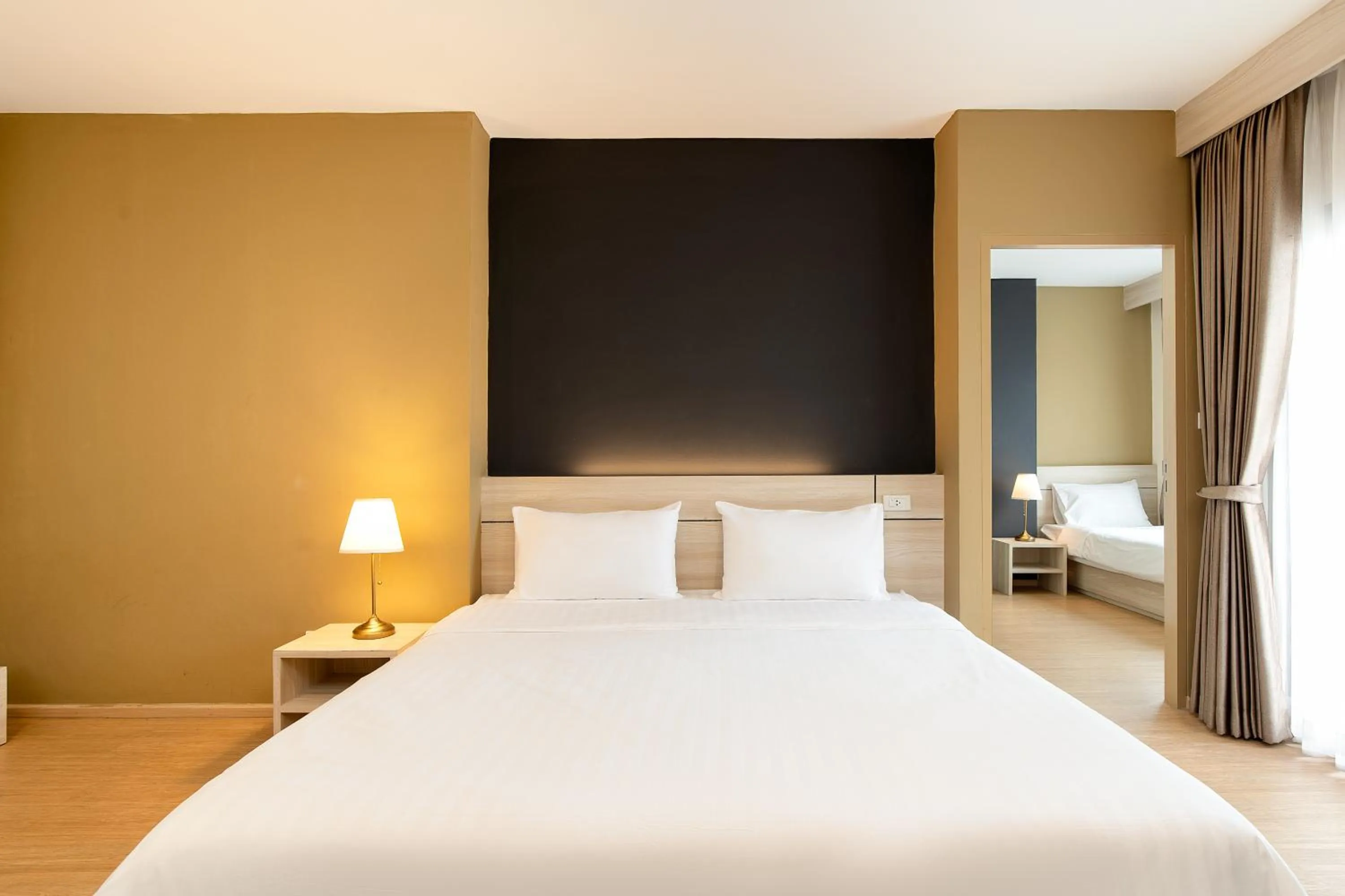 Deluxe Triple Room in Amanah Bangkok Hotel