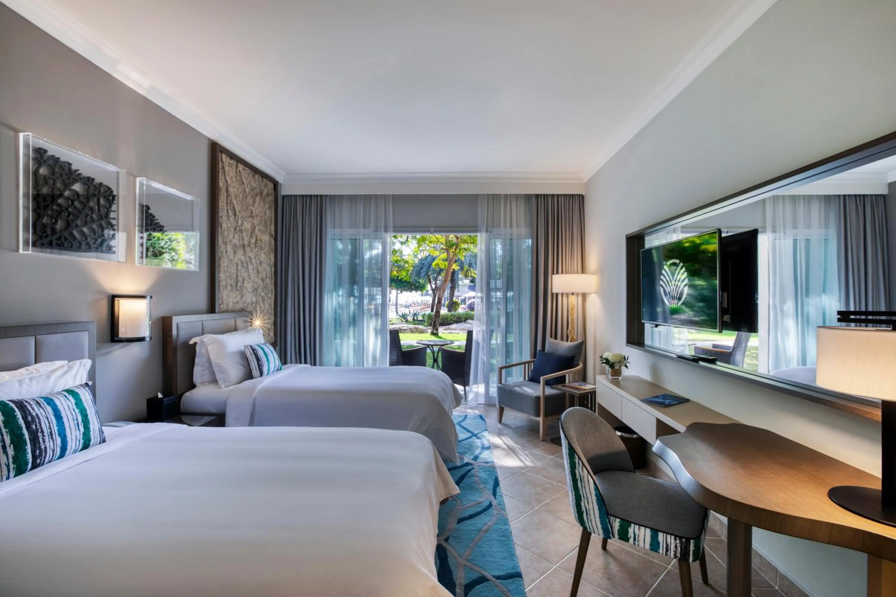 Garden View Room with Terrace - Twin Beds in Fujairah Rotana Resort & Spa - Al Aqah Beach