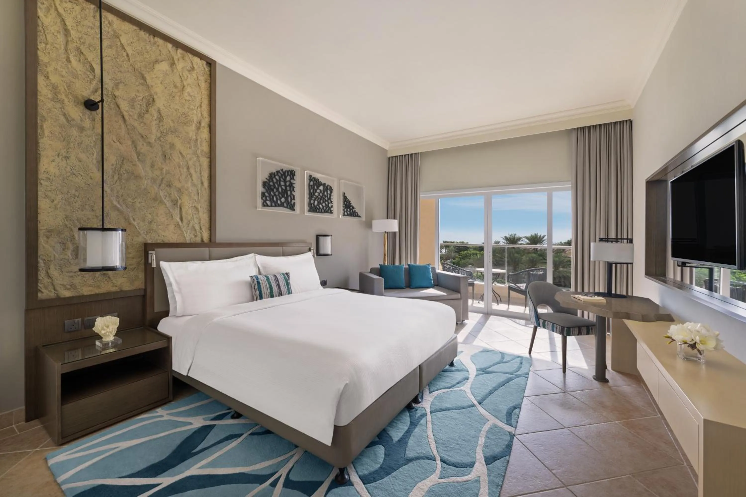 Family Connecting Rooms - King and Twin Beds in Fujairah Rotana Resort & Spa - Al Aqah Beach