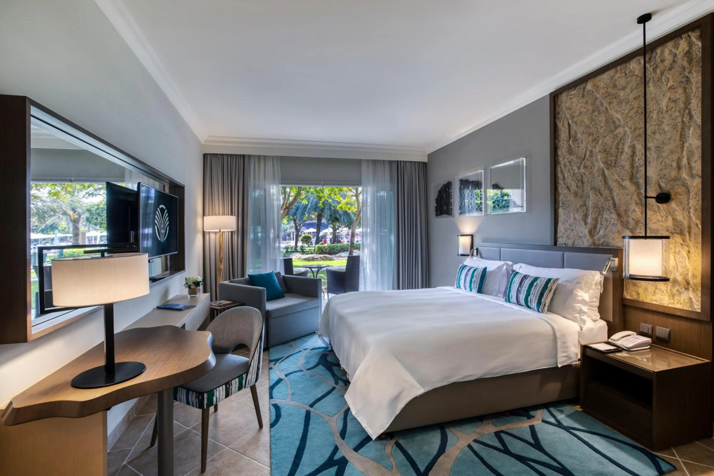 Garden View Room with Terrace - King Bed in Fujairah Rotana Resort & Spa - Al Aqah Beach