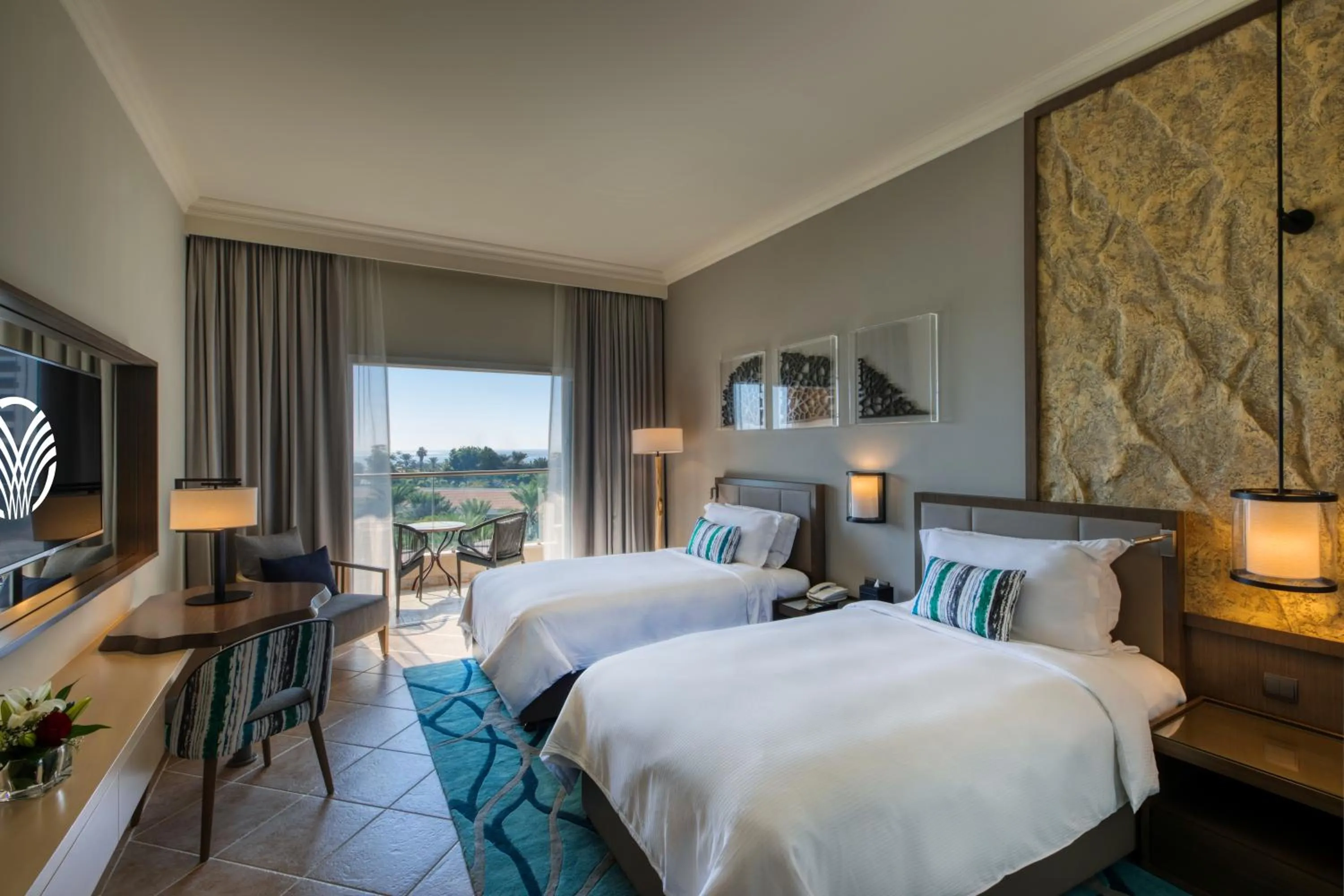 Guest Room - Twin Beds in Fujairah Rotana Resort & Spa - Al Aqah Beach